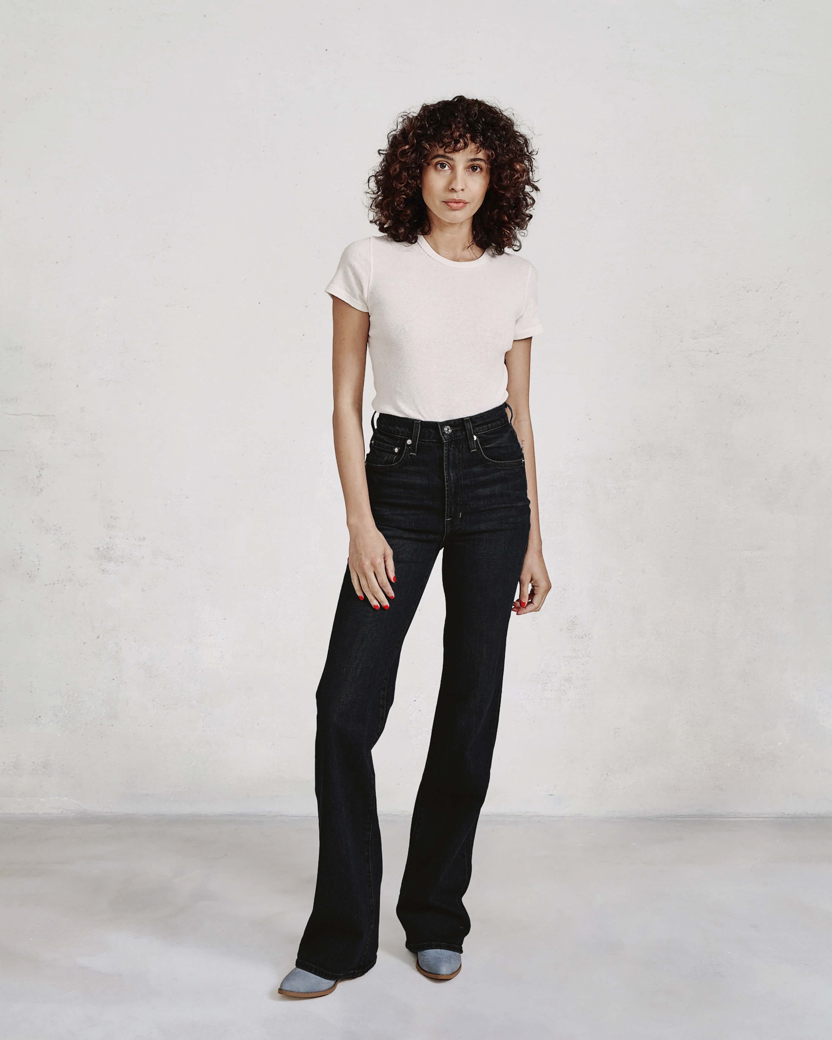 Discover the Ryder in Lucid, the perfect high-rise boot cut jeans for today's cowgirl. Flattering and stylish, these denim pants elevate your western wardrobe.