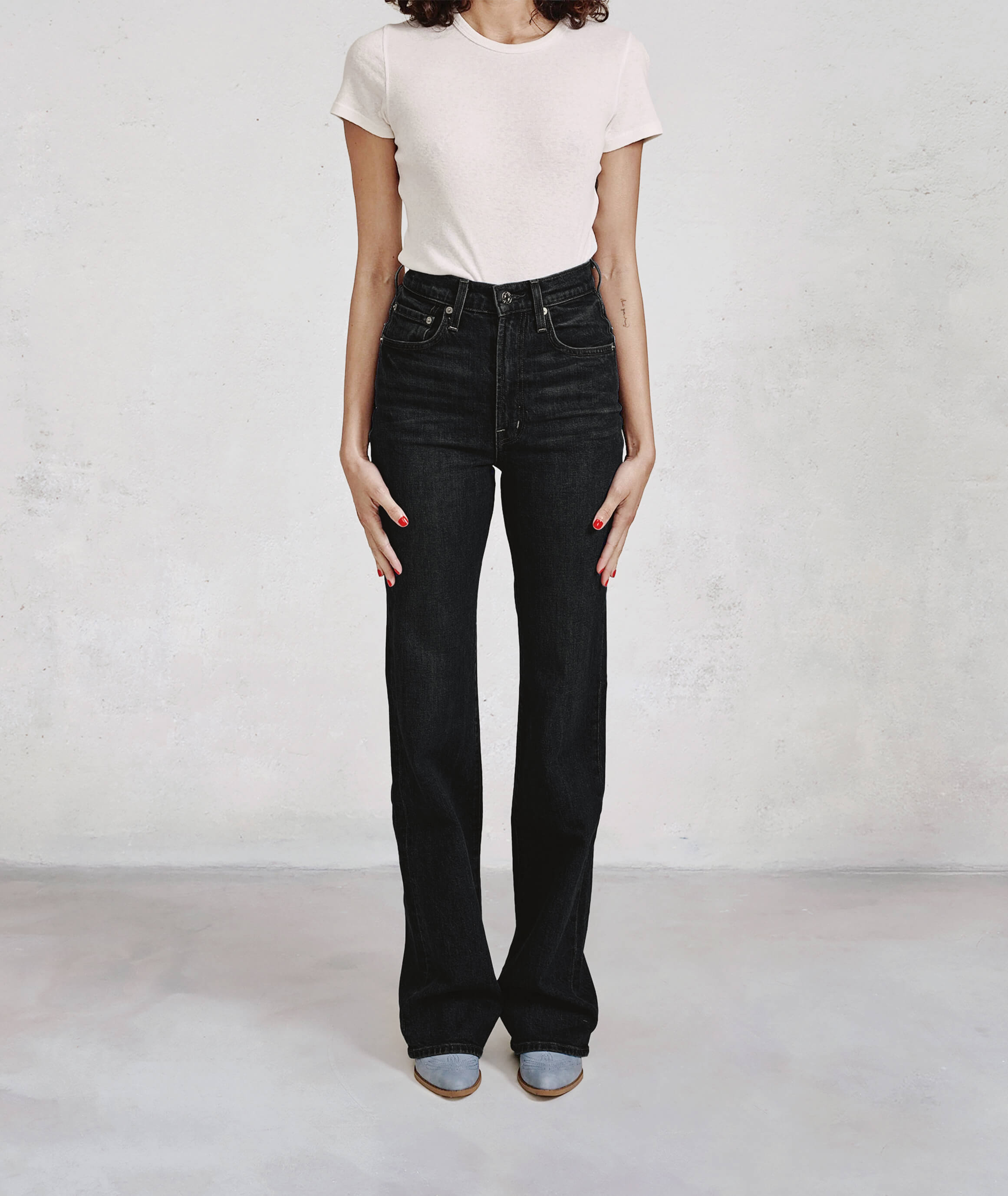 Discover the Ryder in Lucid, the perfect high-rise boot cut jeans for today's cowgirl. Flattering and stylish, these denim pants elevate your western wardrobe.