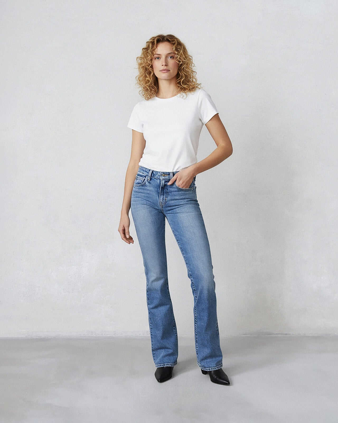 Lark Bootcut Mid Rise in Alpine. Made with low-impact regenerative cotton fabric. Made in the USA, offering lasting comfort with a flattering fit.