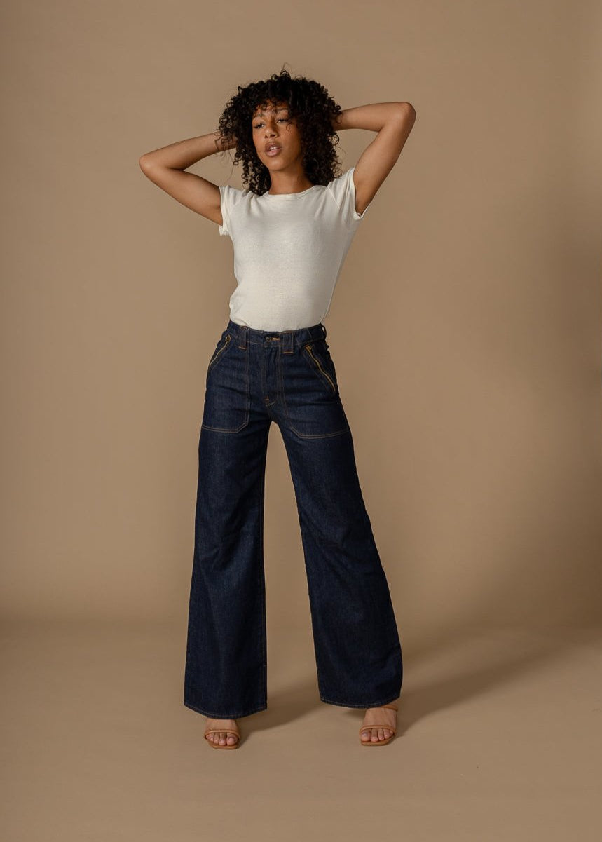 Discover the Rowan Wide Leg Rinse jeans, featuring a vintage-inspired design, ultra high rise, and a flattering fit that sits perfectly at the natural waistline.
