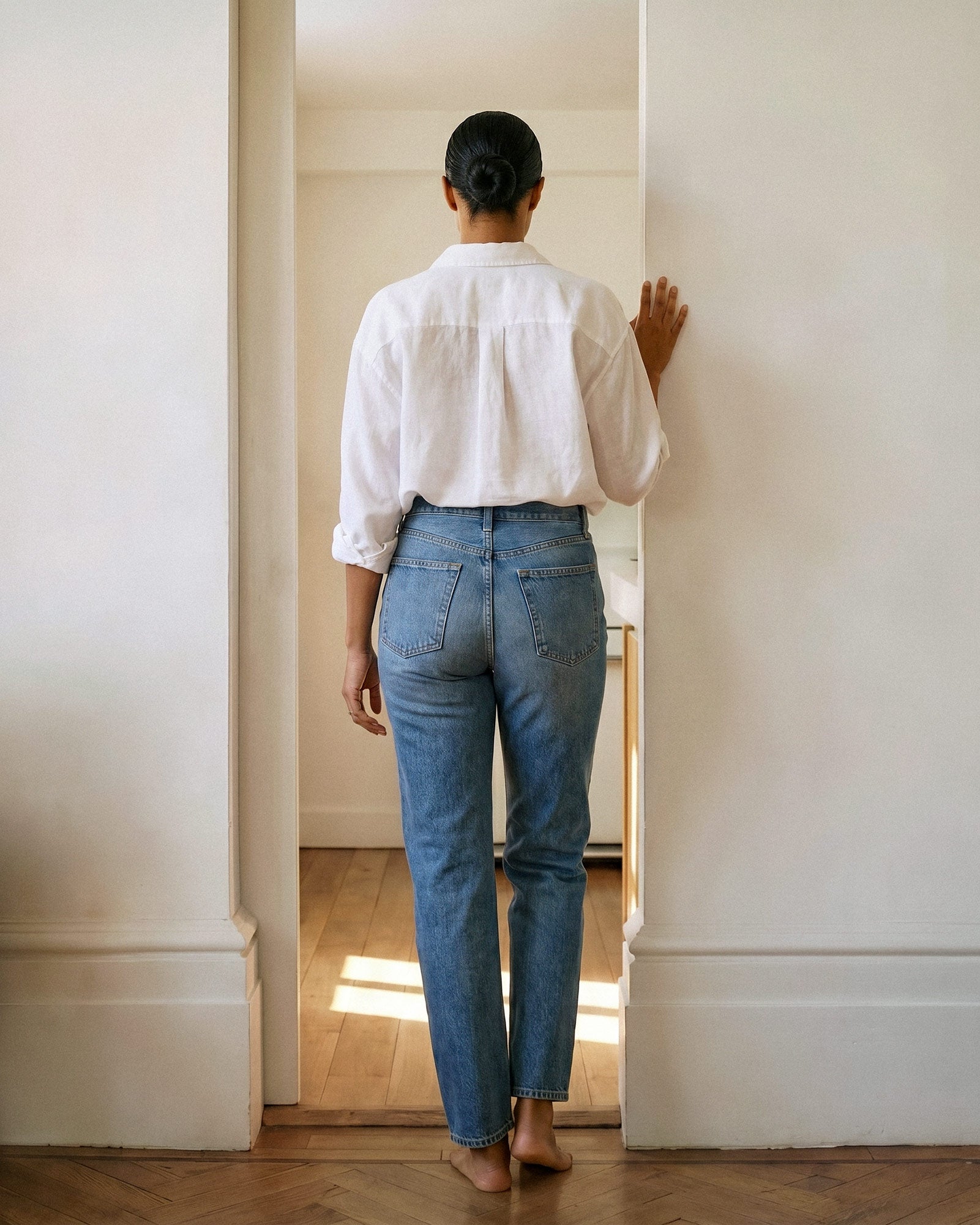 Discover the CAI in Lumineer, a stylish high-rise women's jean featuring a classic straight leg and relaxed silhouette, designed for ultimate comfort and versatility.