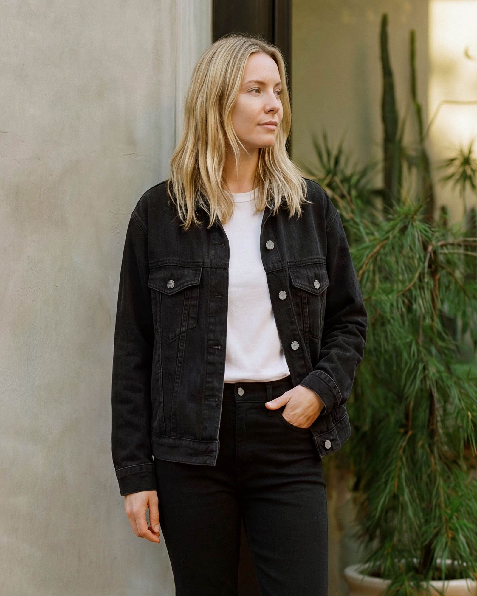 Shop EDWIN USA's oversized trucker jacket for women in carbon black, combining bold style with comfortable fit for everyday wear.