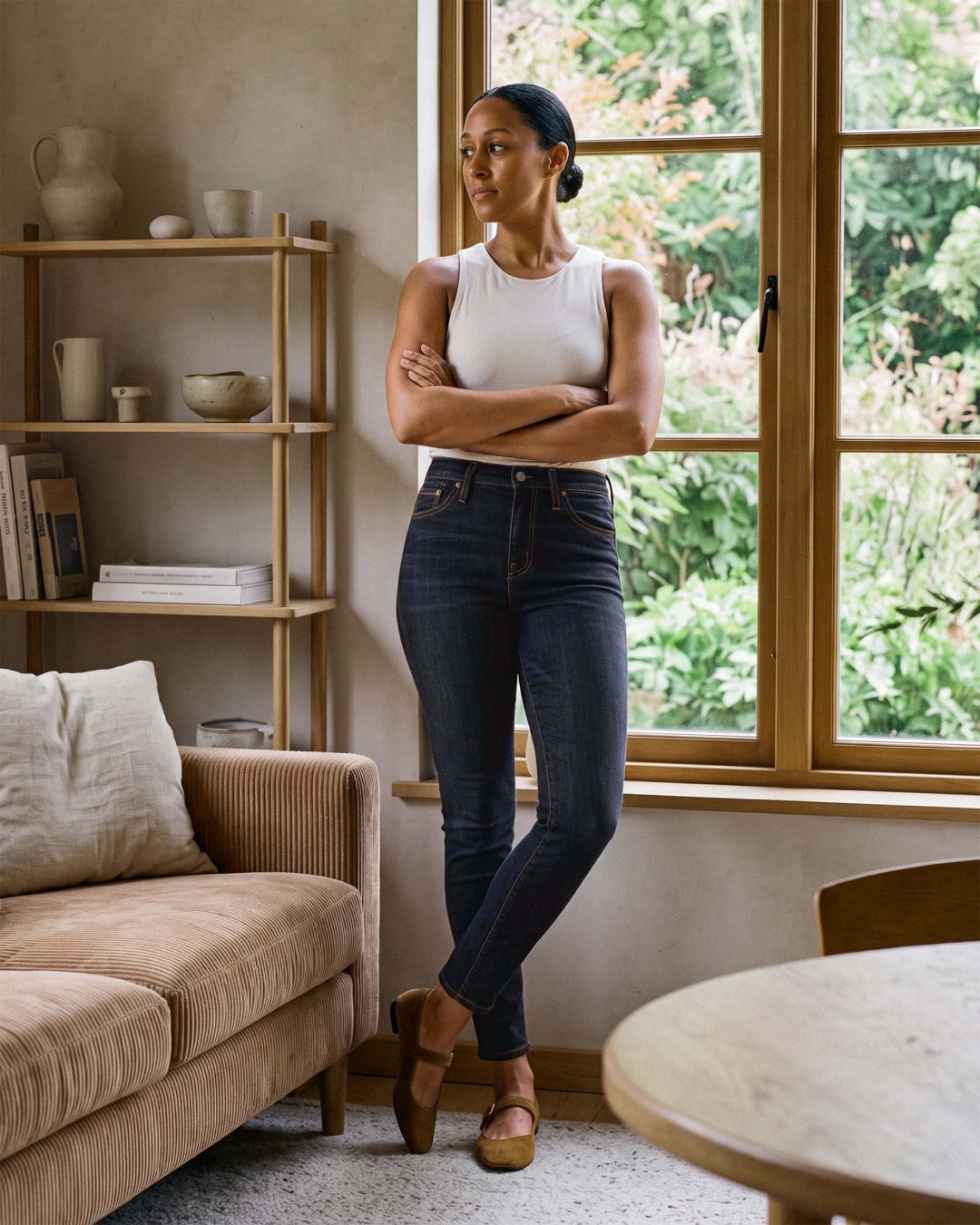 The CANDICE is a women's high-rise skinny jean with an ultramodern silhouette. It sits at the natural waist and features a super skinny fit from hip to ankle. In a clean, dark indigo wash with a natural whisker pattern.