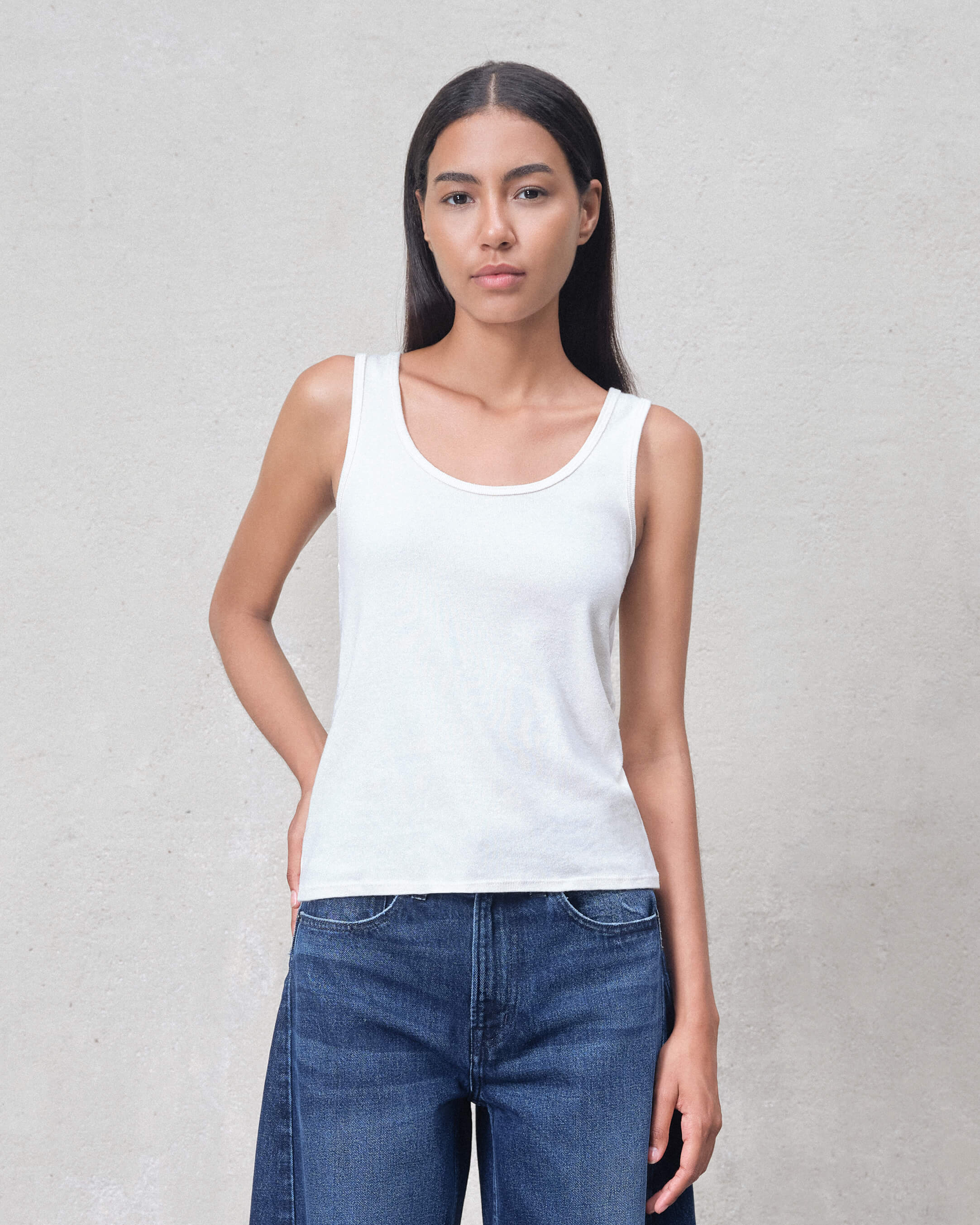 Discover ultimate comfort with our Off-White Tank. Crafted from soft ribbed cotton, this classic fit tank top is perfect for everyday wear and effortless style.