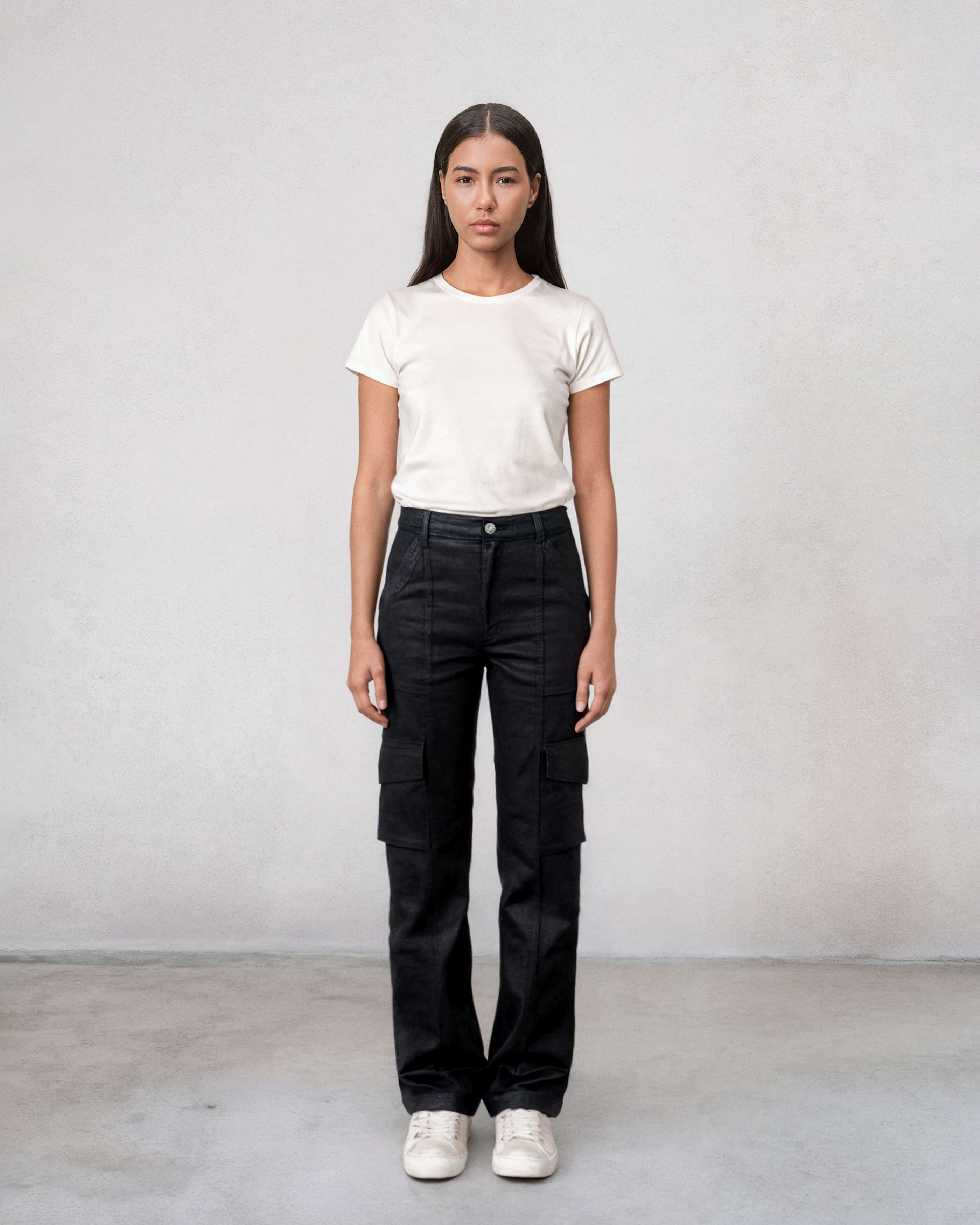 Elevate your style with the Keegan Cargo Pant in coated black. Perfect for work or play, these versatile pants transition effortlessly from day to night.