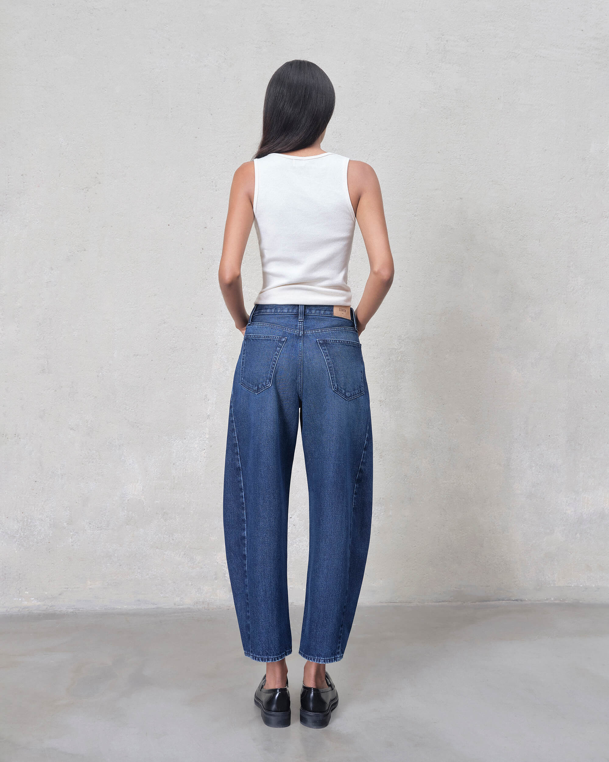 Discover ultimate comfort with our Off-White Tank. Crafted from soft ribbed cotton, this classic fit tank top is perfect for everyday wear and effortless style.