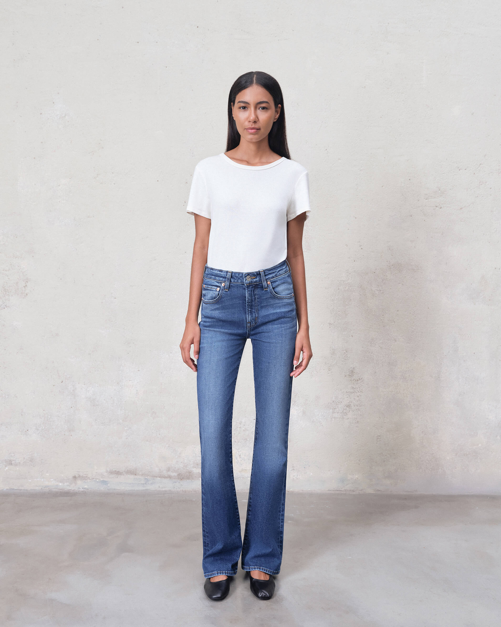 Lark Bootcut Mid Rise in LANCELOT. Made with low-impact regenerative cotton fabric. Made in the USA, offering lasting comfort with a flattering fit.