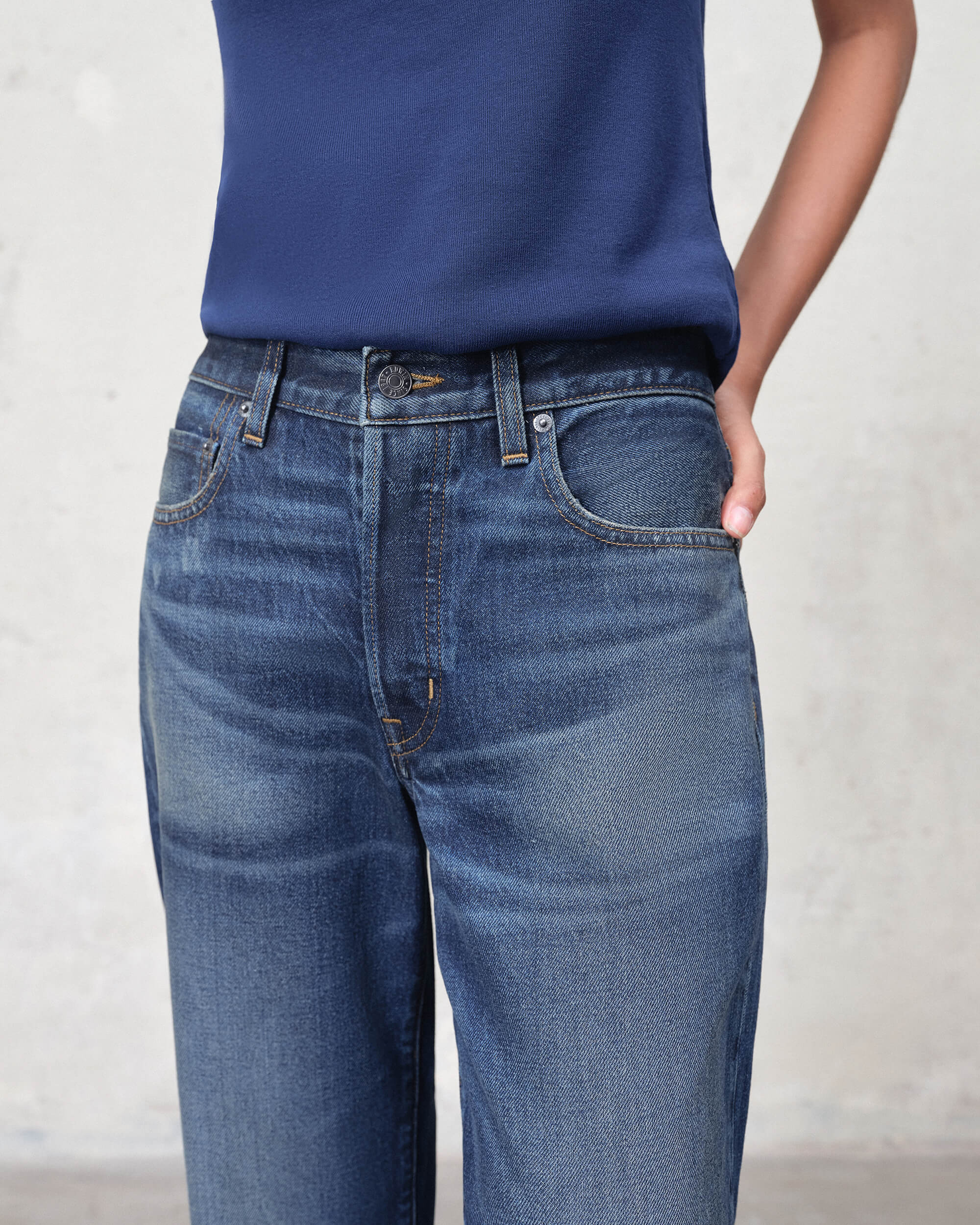 Sawyer Boyfriend Mid Rise in MAGNOLIA COATED. Built with regenerative cotton for conscious comfort. Made in the USA, offering a polished look that wears like a second skin.