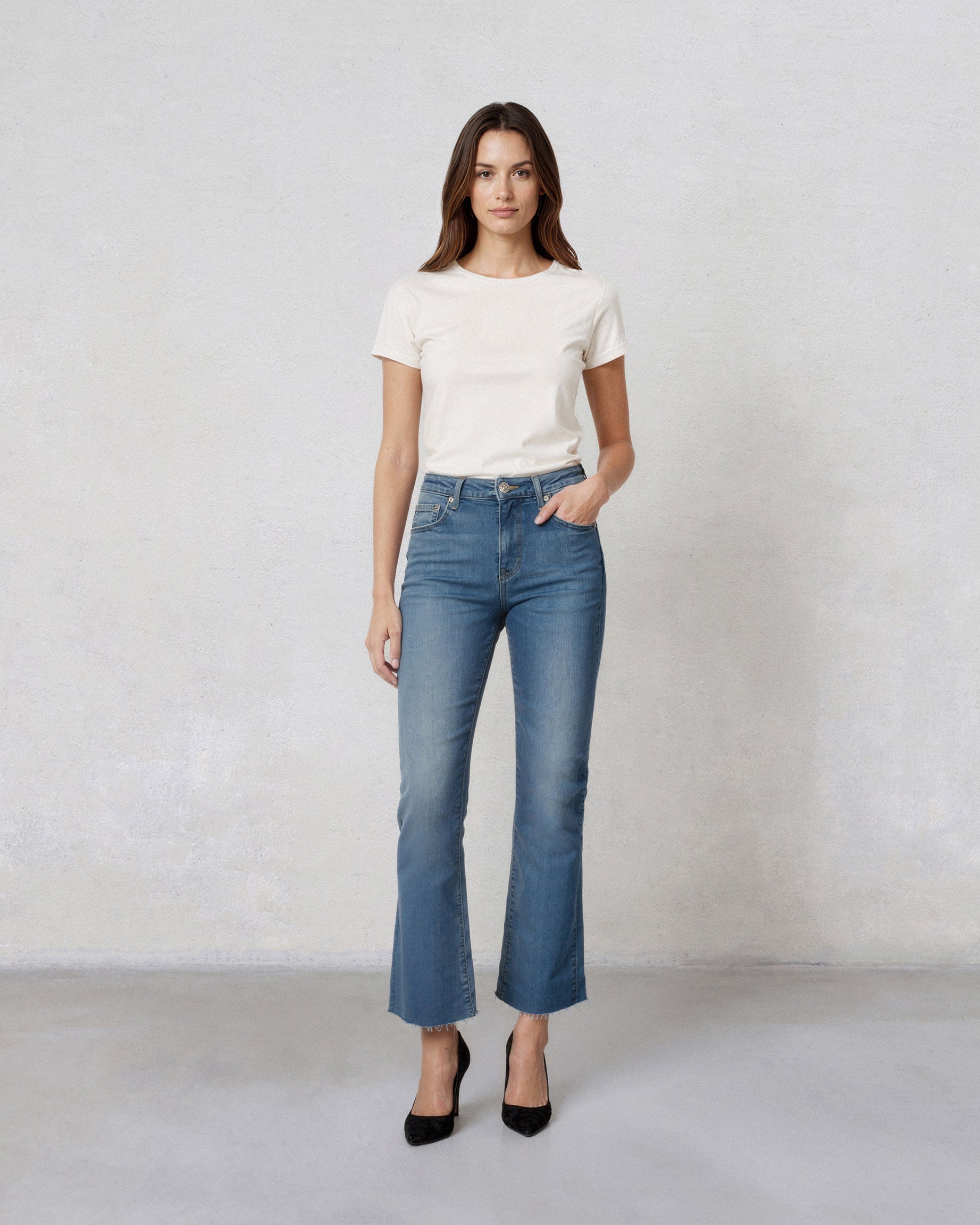 Discover the Edwin Lark Bootcut with Raw Hem in Emory, a stylish mid-rise jean that offers a flattering fit and a modern twist on classic bootcut design!