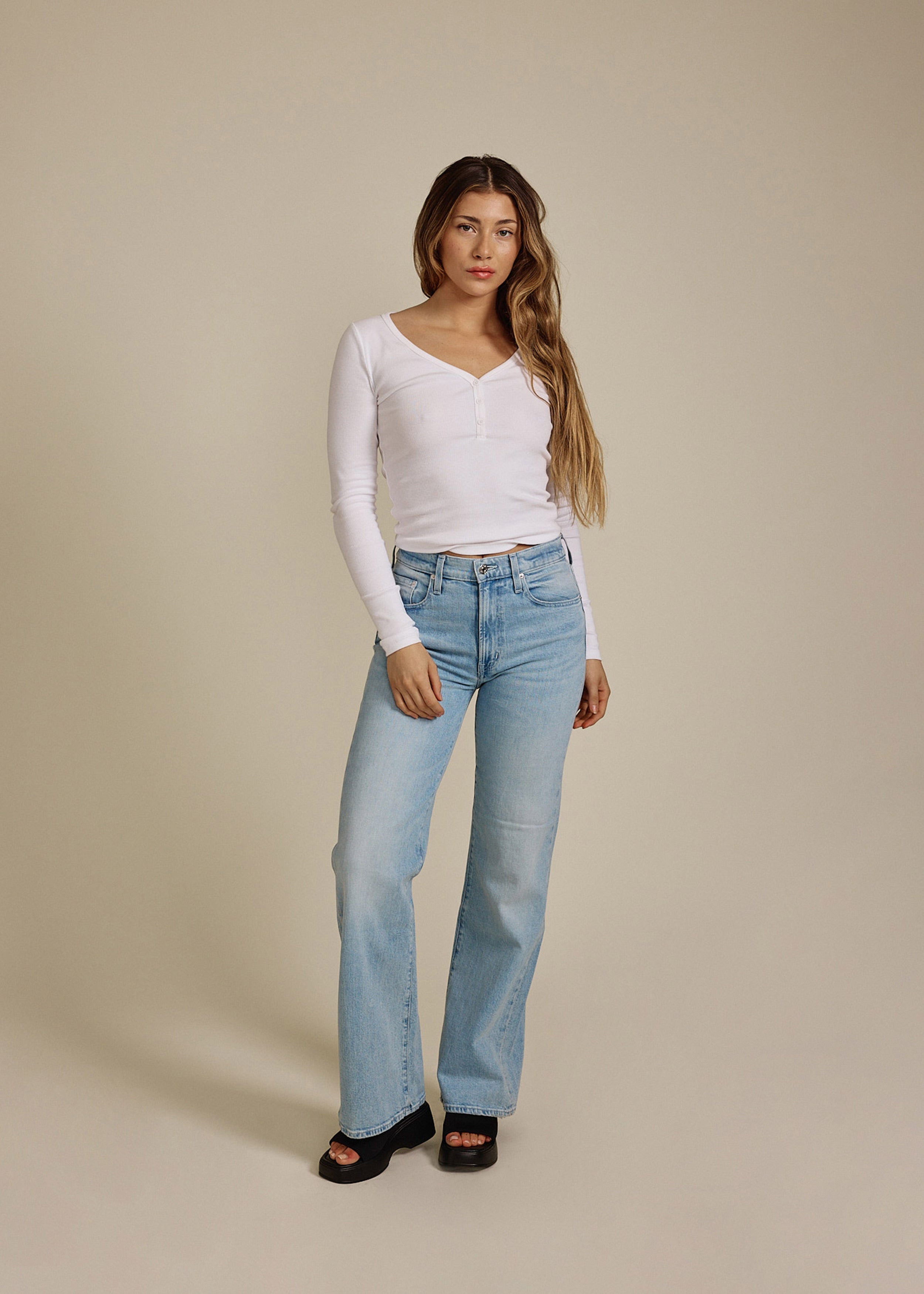 Discover the Marli Wide Leg Crosby, a stylish high-rise denim pant that flatters your waist and hips while offering a relaxed fit for effortless casual elegance.