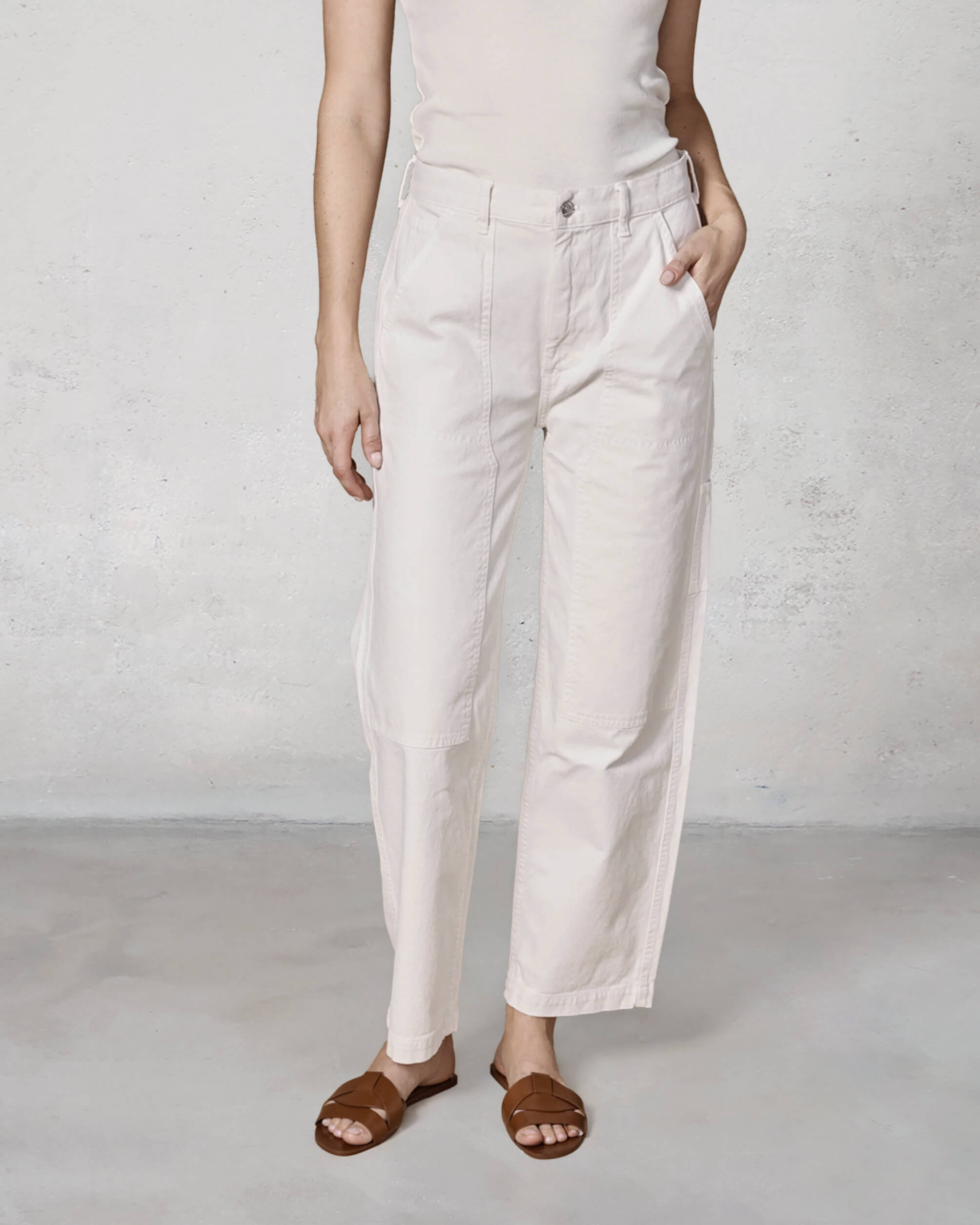 Discover the Hayley Pant in Stone, a versatile pull-on style crafted from organic cotton, perfect for work or a chic dinner date. Elevate your wardrobe today!