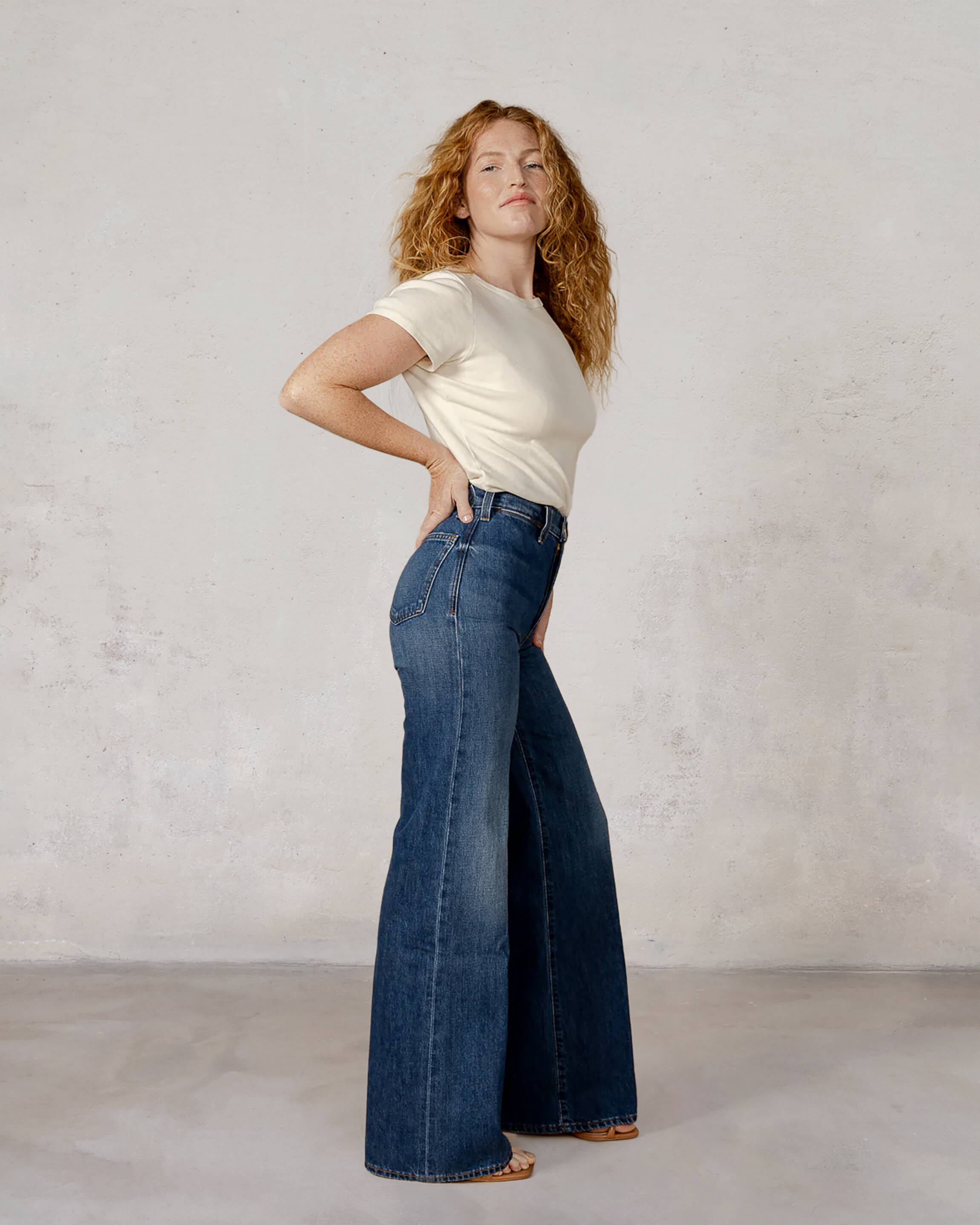 Elevate your style with the Iris Palazzo pant. This high-waisted, slim wide-leg design offers comfort and versatility for any fall occasion.