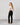 Explore the Bree Slim Skinny in black, featuring a stylish raw hem. Experience the perfect blend of comfort and modern design for any occasion. Elevate your wardrobe!
