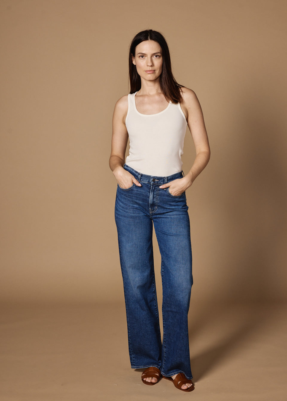 Elevate your style with the Marli Wide Leg Lowell jeans. These high-rise denim pants offer a flattering fit and relaxed comfort, perfect for any casual occasion.