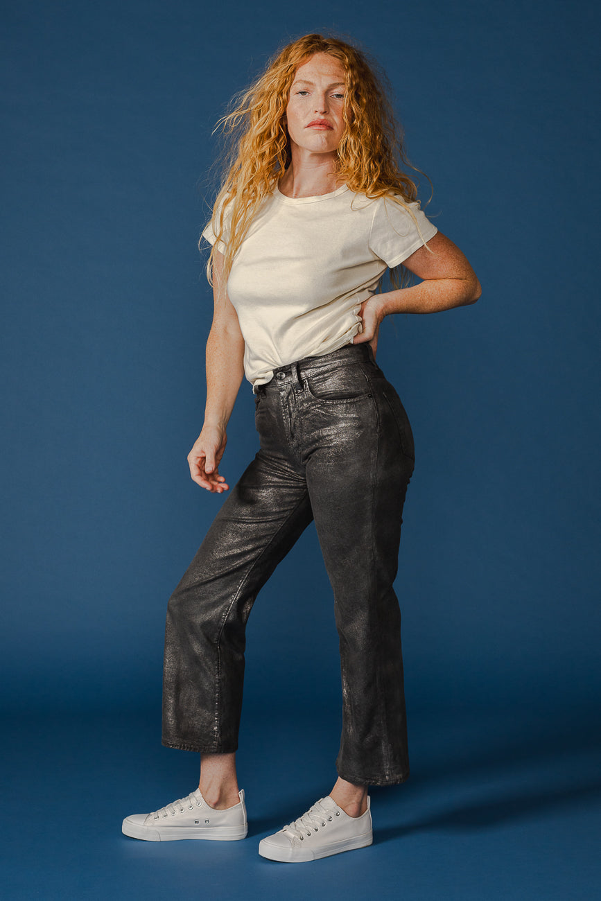 Discover the Marli Wide Leg Lowell, a stylish high-rise denim pant that flatters your waist and hips while offering a relaxed fit for effortless casual elegance.