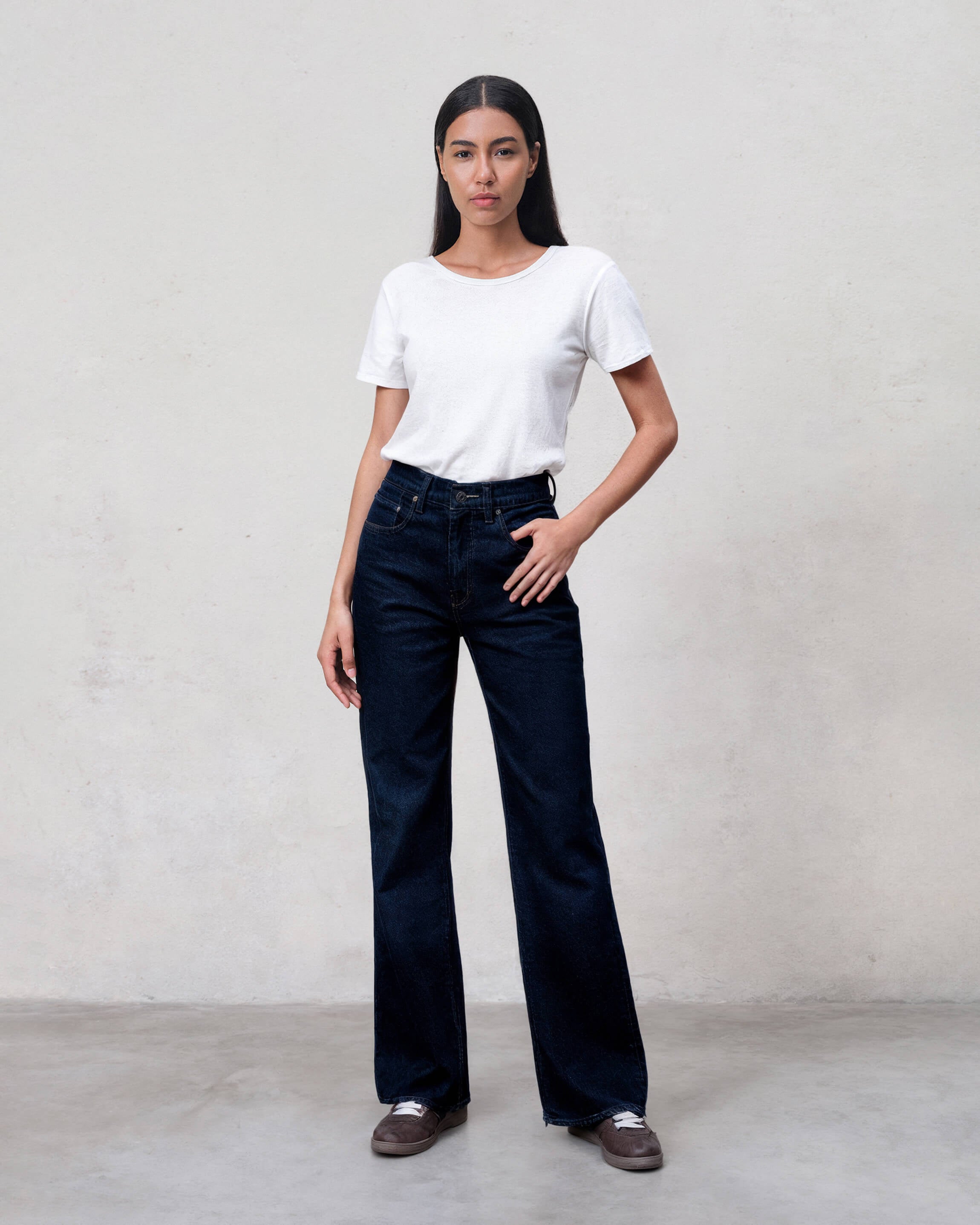 Discover the Marli Wide Leg Denim Pant, featuring a flattering high-rise design and a relaxed fit from the thigh down, perfect for effortless casual style.