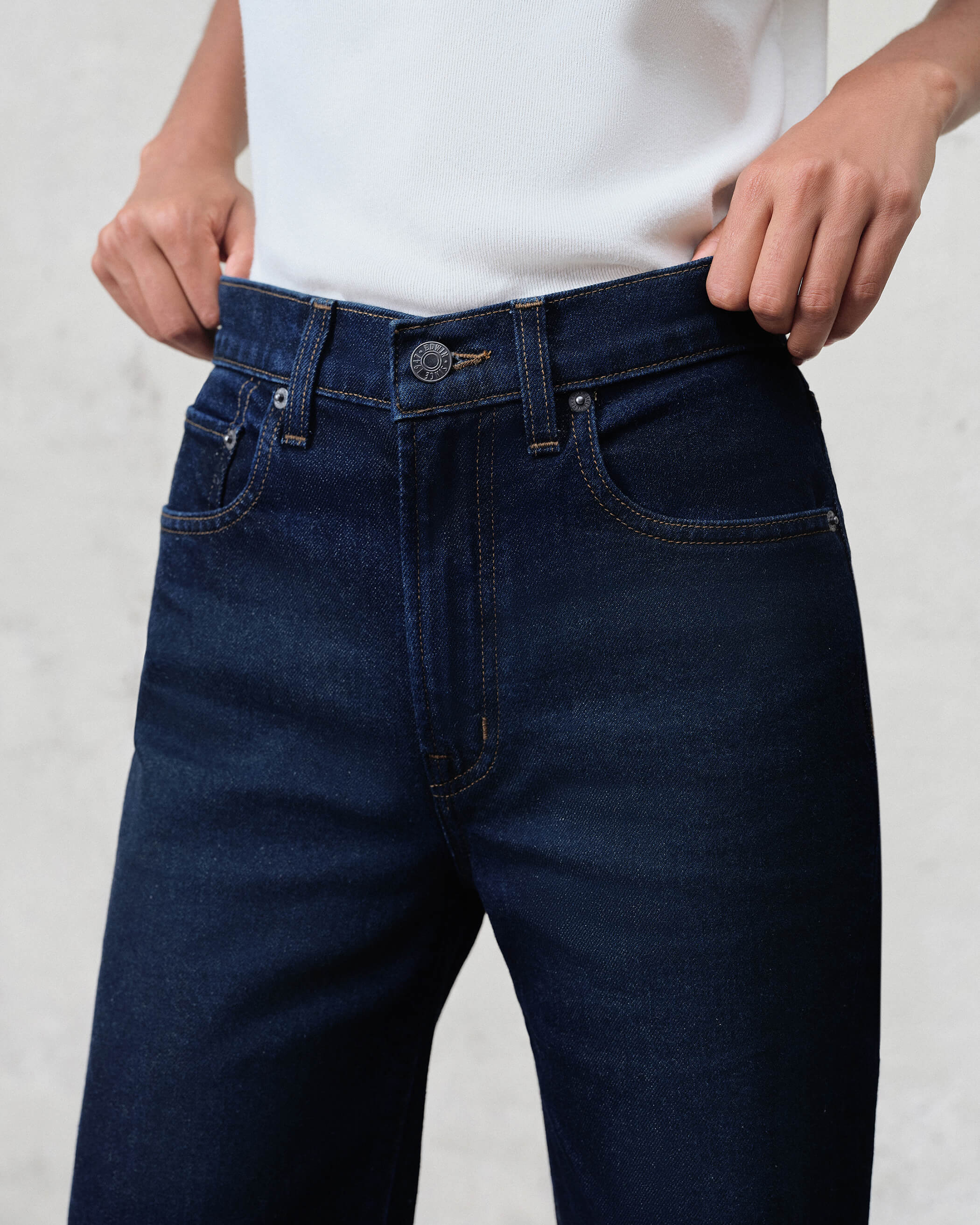 Discover the Marli Wide Leg Denim Pant, featuring a flattering high-rise design and a relaxed fit from the thigh down, perfect for effortless casual style.