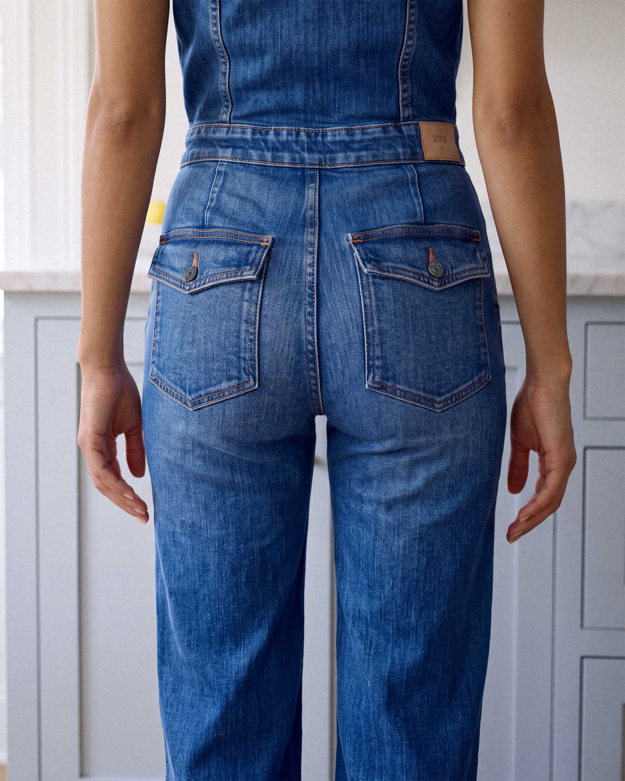 Discover the Manhattan Jumpsuit: a playful and versatile piece featuring a high-rise fit, wide legs, and a touch of flair. Elevate your style effortlessly!