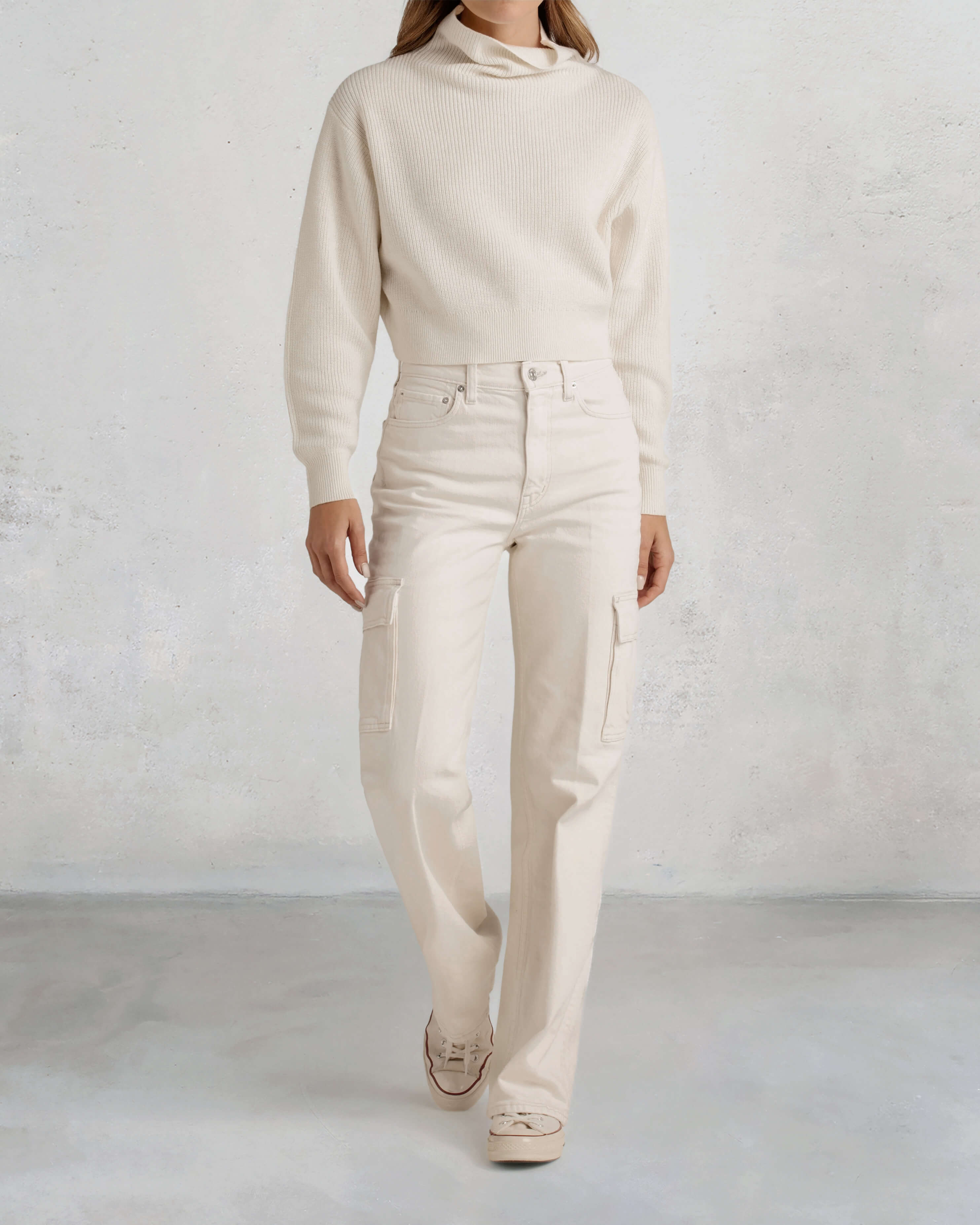 Elevate your workwear style with the Cora Cargo Pant in Monochrome. Perfect for work or play, these versatile pants transition effortlessly from day to night.