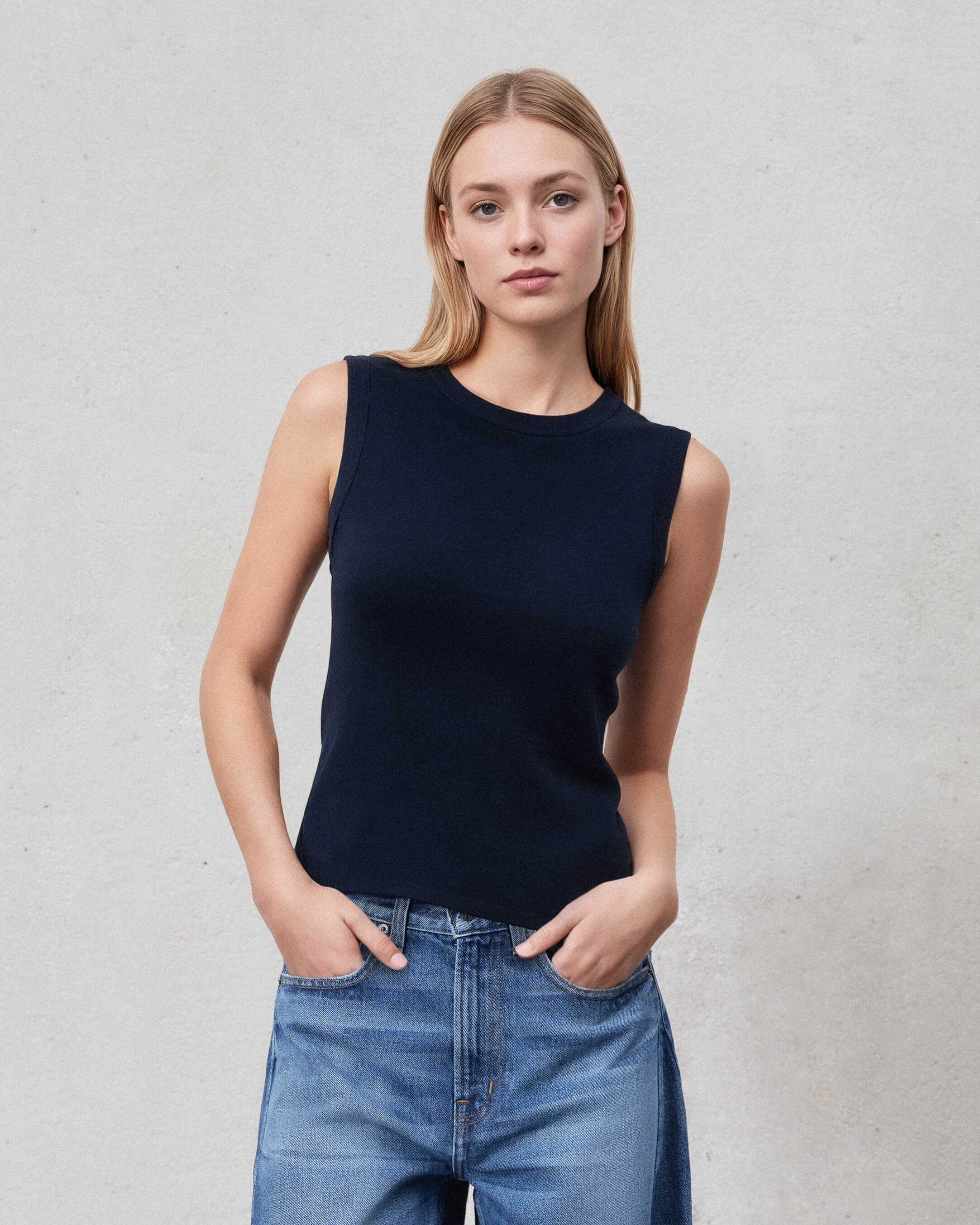 Elevate your style with our Vintage Black Muscle Tank. Crafted from premium ribbed cotton, it features a relaxed fit and timeless design for versatile everyday wear.