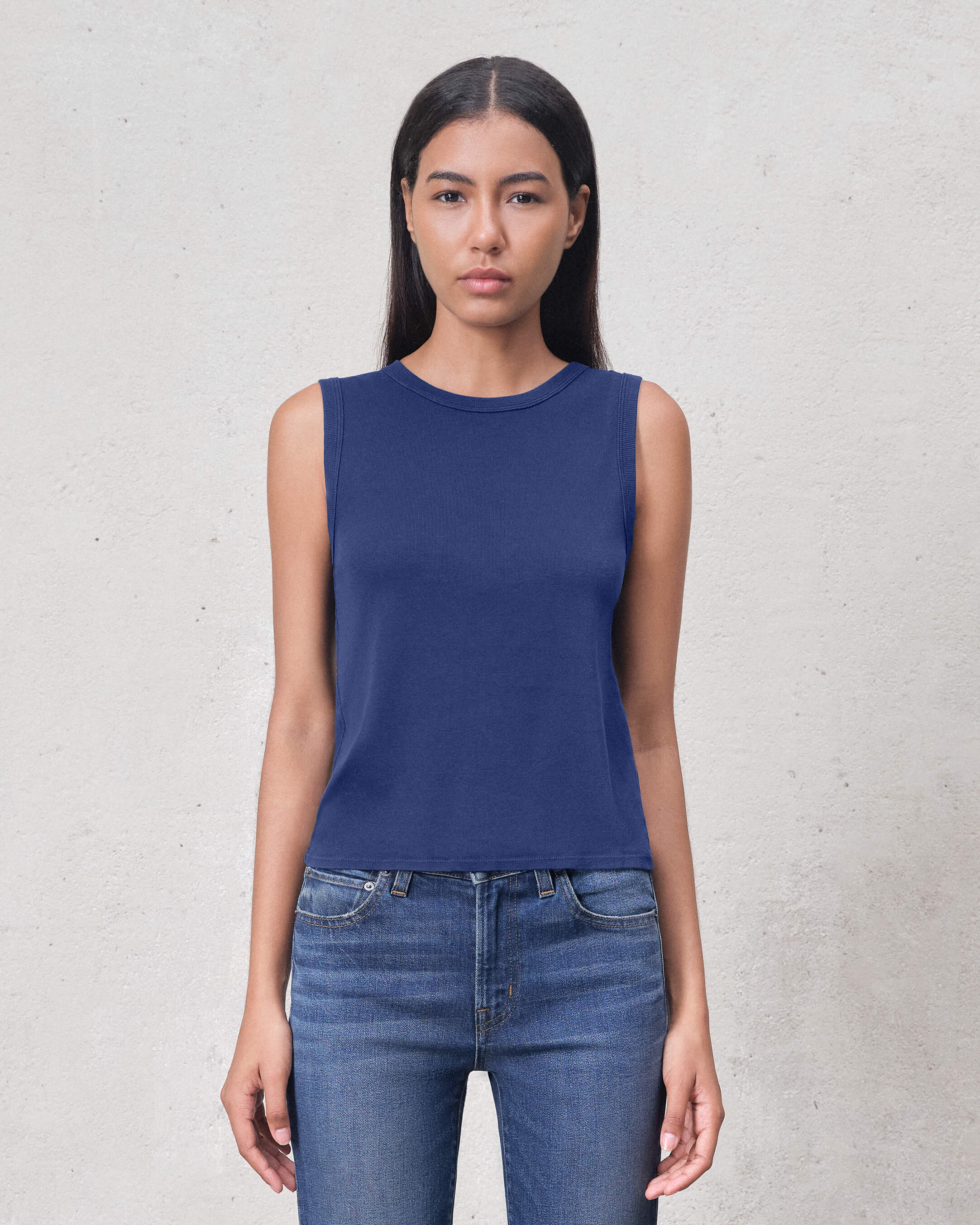 Elevate your wardrobe with our Vintage Navy Muscle Tank, made from premium ribbed cotton for a relaxed fit. Perfect for layering or wearing solo.