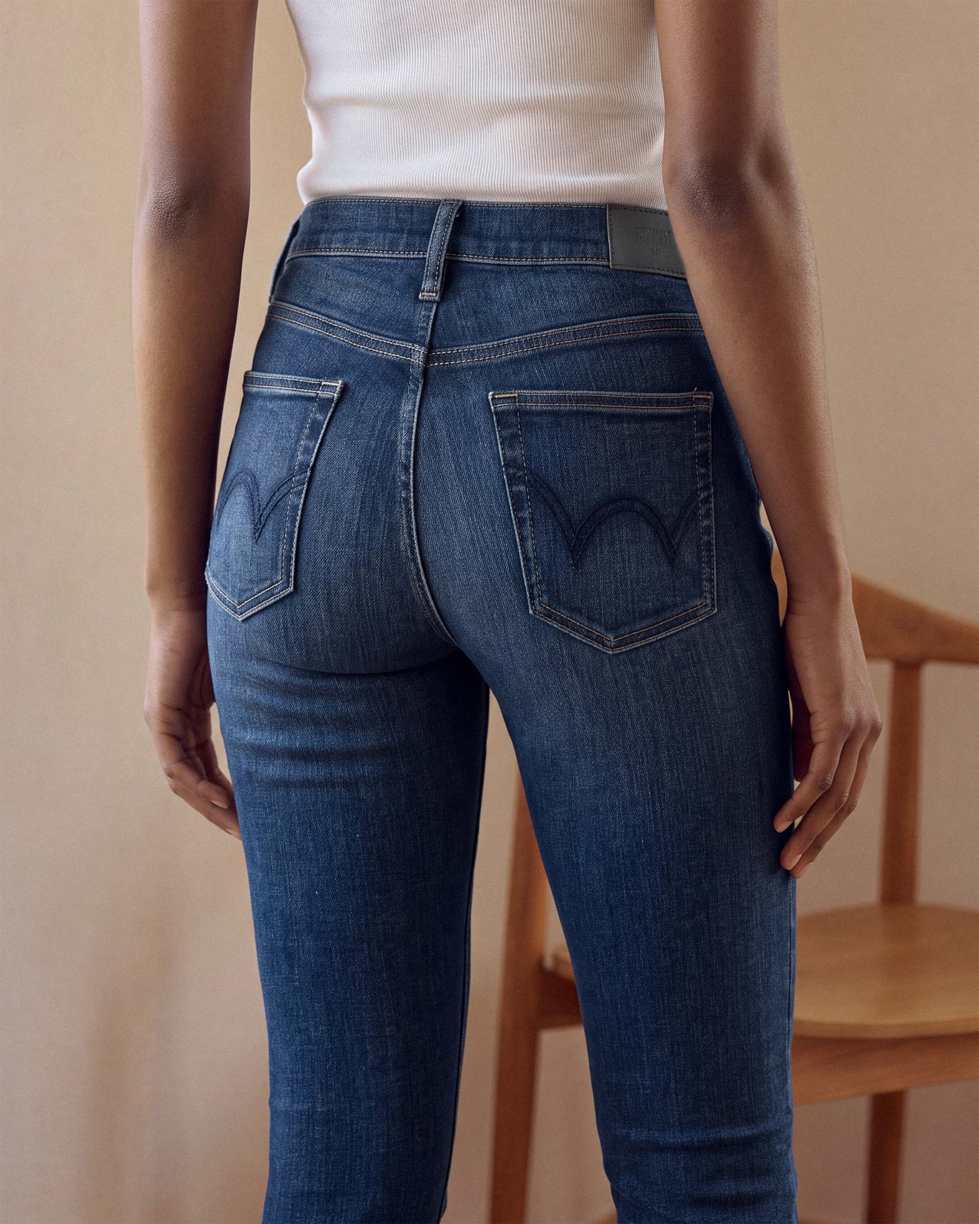 The PIXIE CROP is a women's mid-rise skinny jean with an ultramodern silhouette. It sits just below the waist and features a super skinny fit from hip to above the ankle. In a dark vintage wash with natural wear marks.