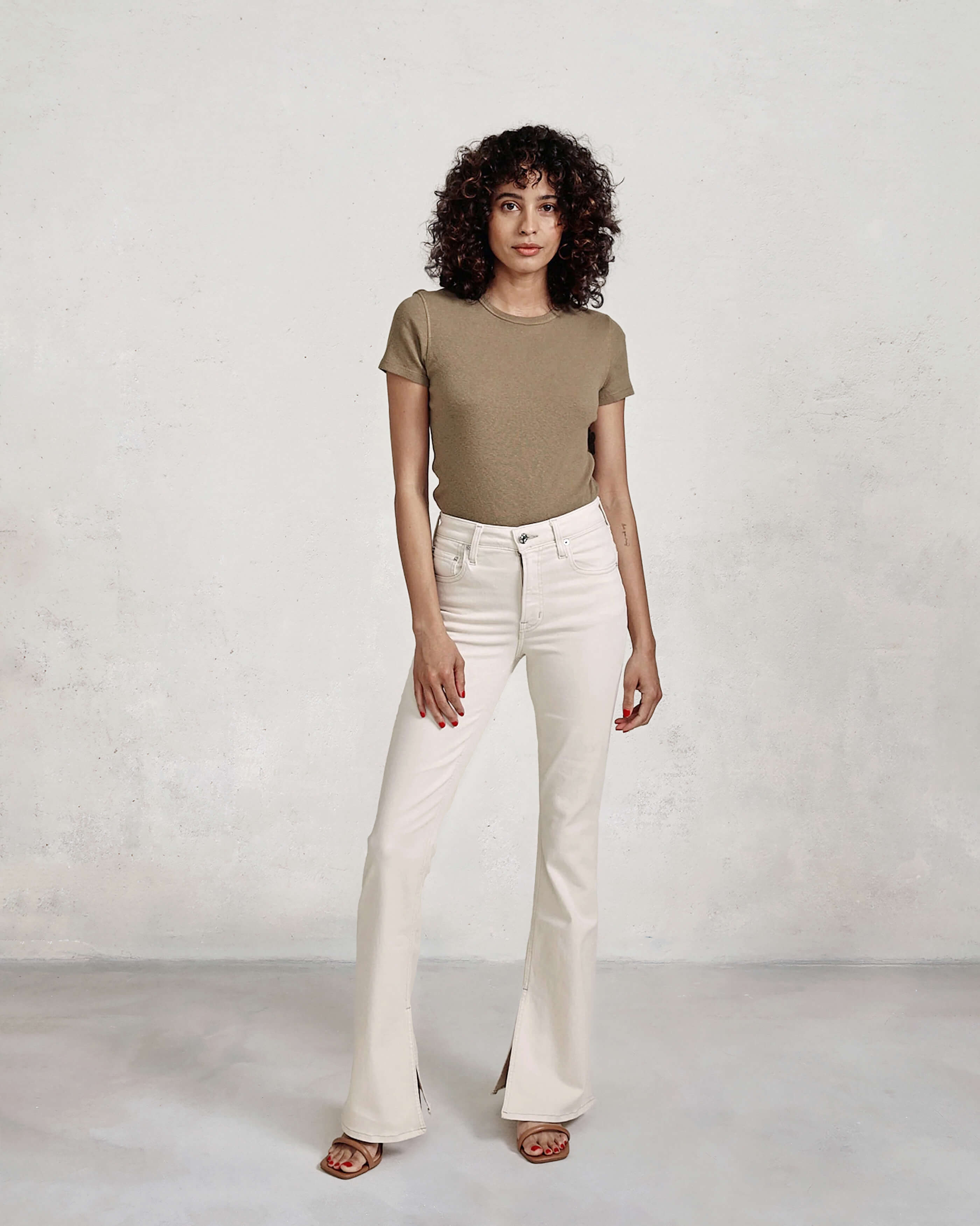 Discover the Edwin Lark Bootcut Split Inseam in Plaster, featuring a flattering fit through the hips and thighs, with a stylish break at the knee for a modern look.