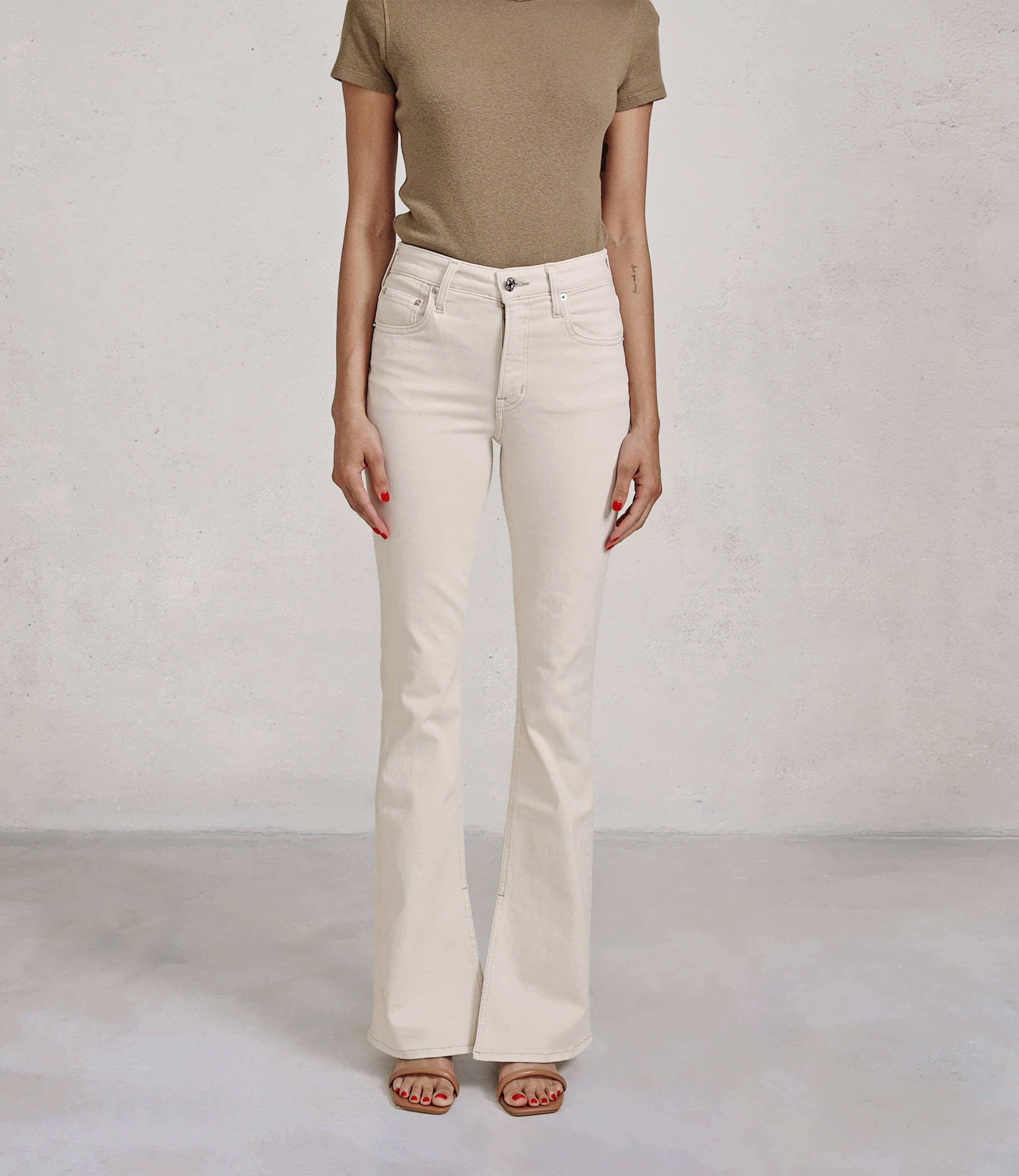 Discover the Edwin Lark Bootcut Split Inseam in Plaster, featuring a flattering fit through the hips and thighs, with a stylish break at the knee for a modern look.