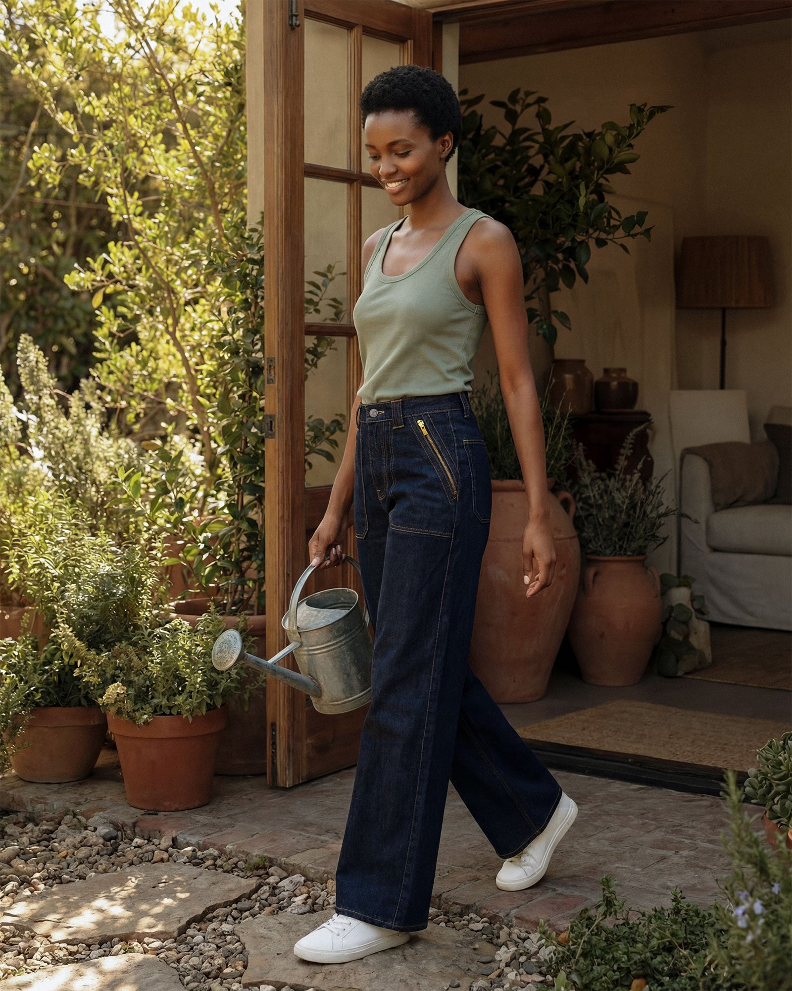 Discover the Rowan Wide Leg Rinse jeans, featuring a vintage-inspired design, ultra high rise, and a flattering fit that sits perfectly at the natural waistline.