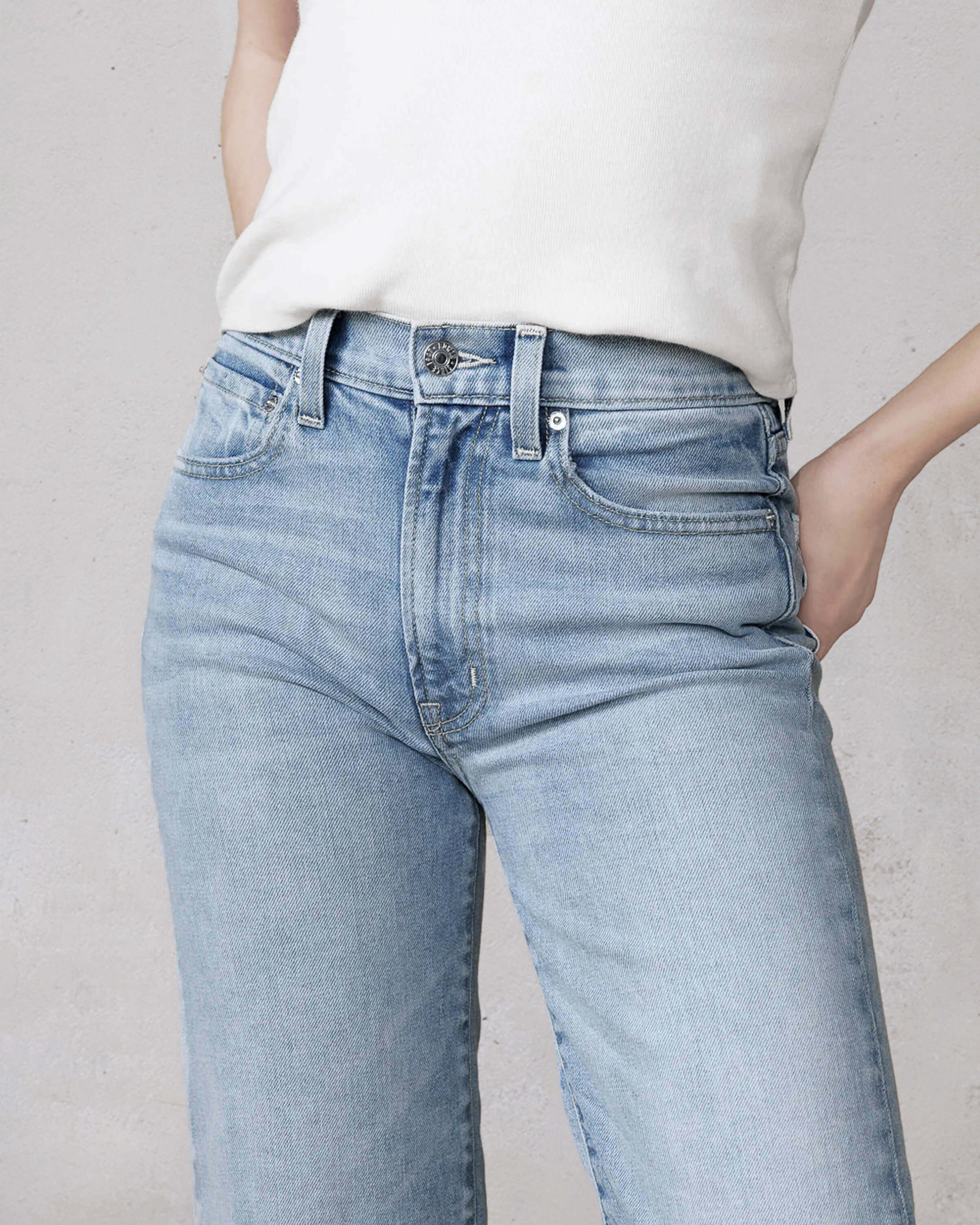 Discover the Edwin Marli Wide Leg Ankle With Raw Hem in Suncrest, featuring a flattering high-rise fit that hugs your waist and hips, then flows into a stylish wide leg design.