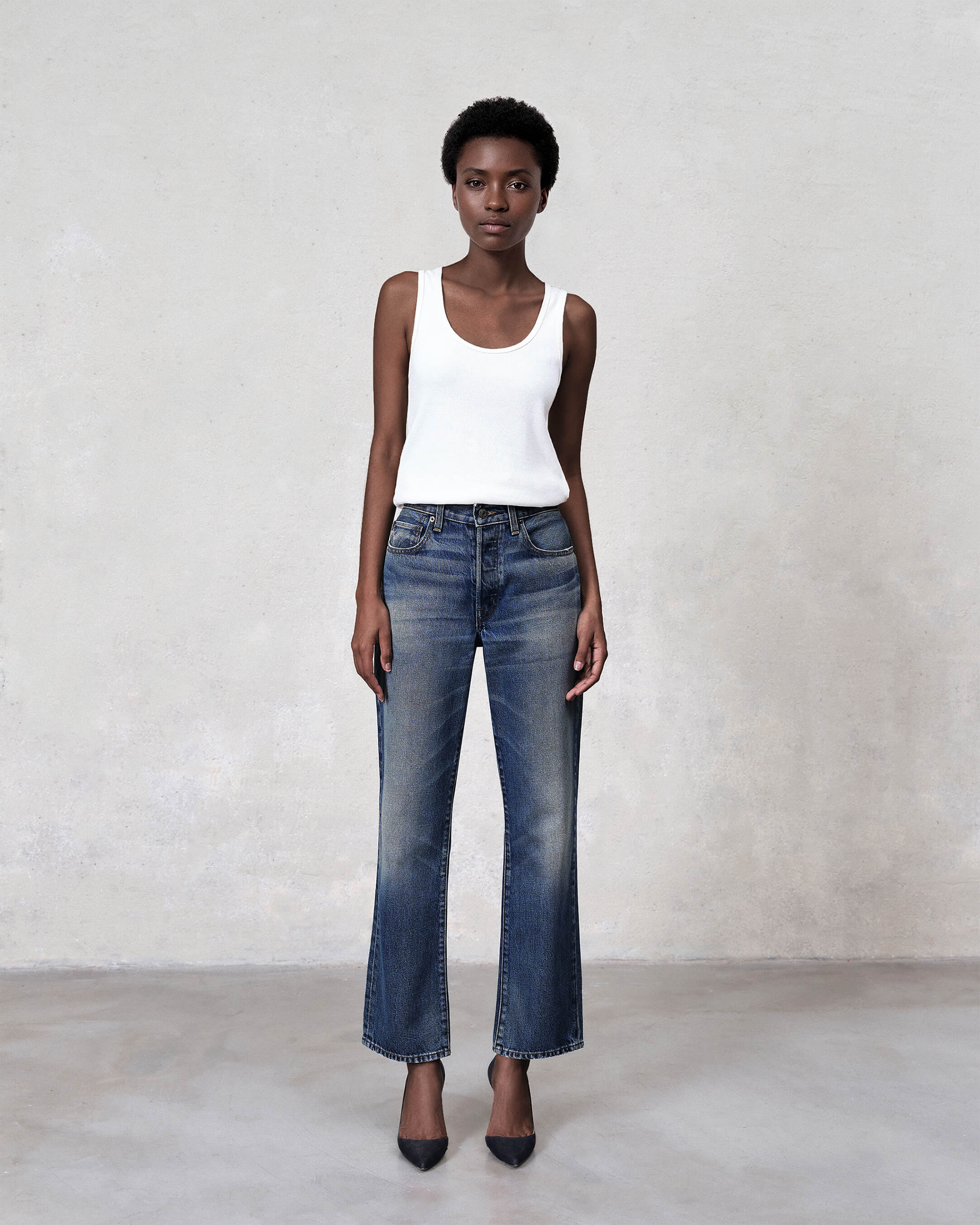 Discover the Sawyer Boyfriend Jeans in Mason, crafted from soft rigid denim for a perfect fit. Elevate your style with this classic wash essential for any wardrobe.