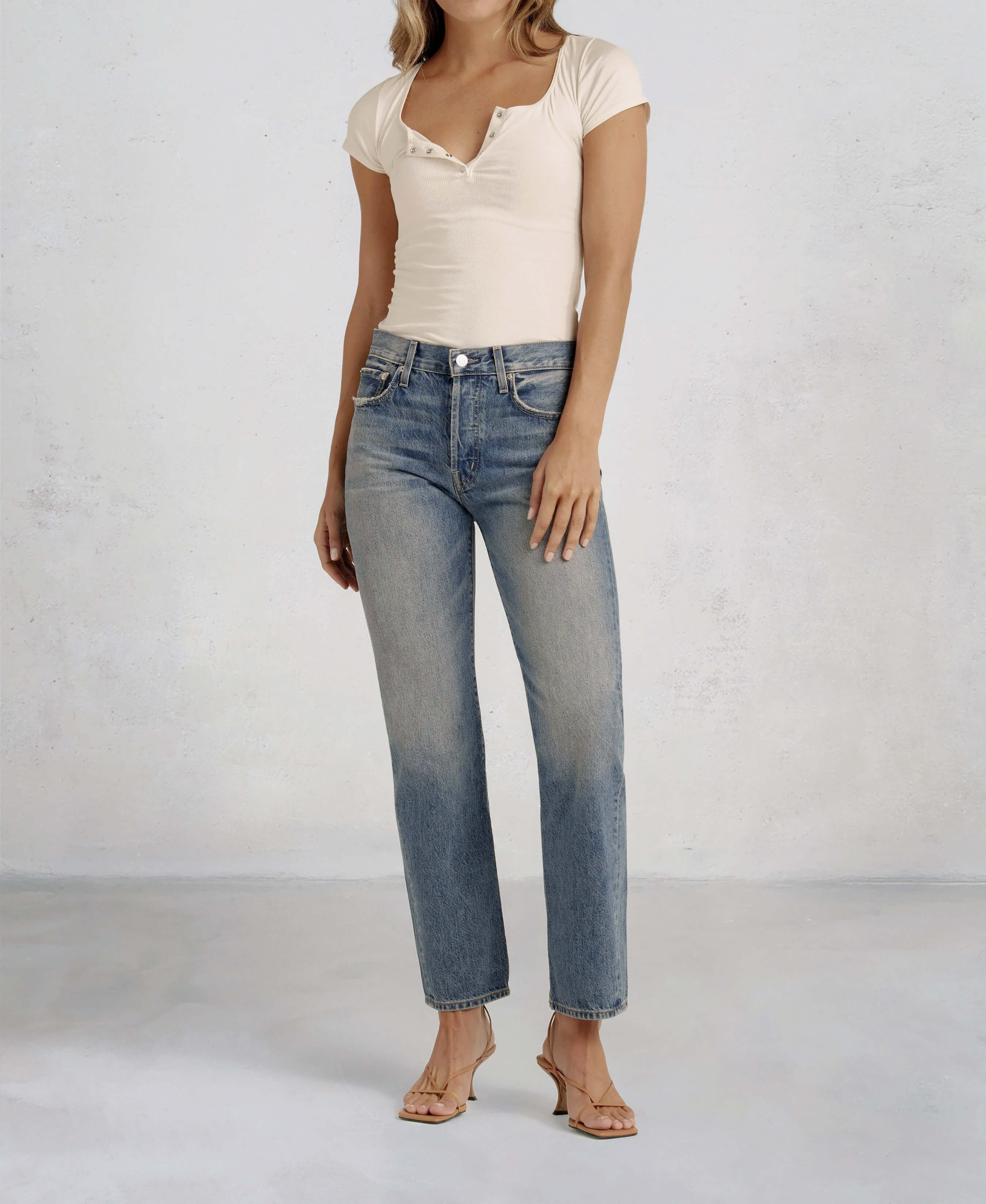 Discover the TASH, a relaxed '90s jean designed for a laid-back vibe. With a straight leg and low-slung fit, it’s perfect for a stylish, boyish look this summer.