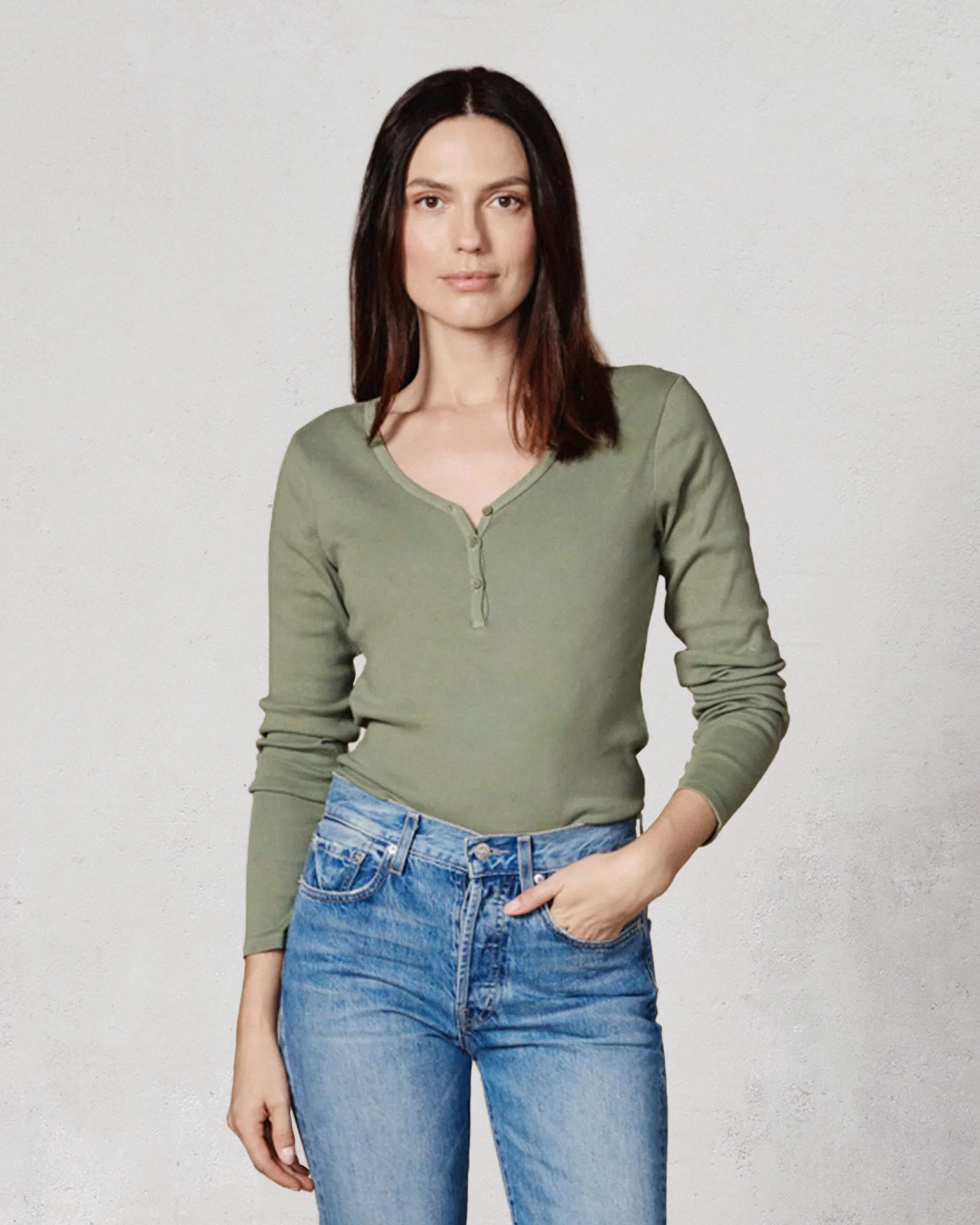 Discover our Vintage Green Henley Long Sleeve Top, blending classic style with a modern fit for a flattering silhouette. Perfect for any casual occasion!