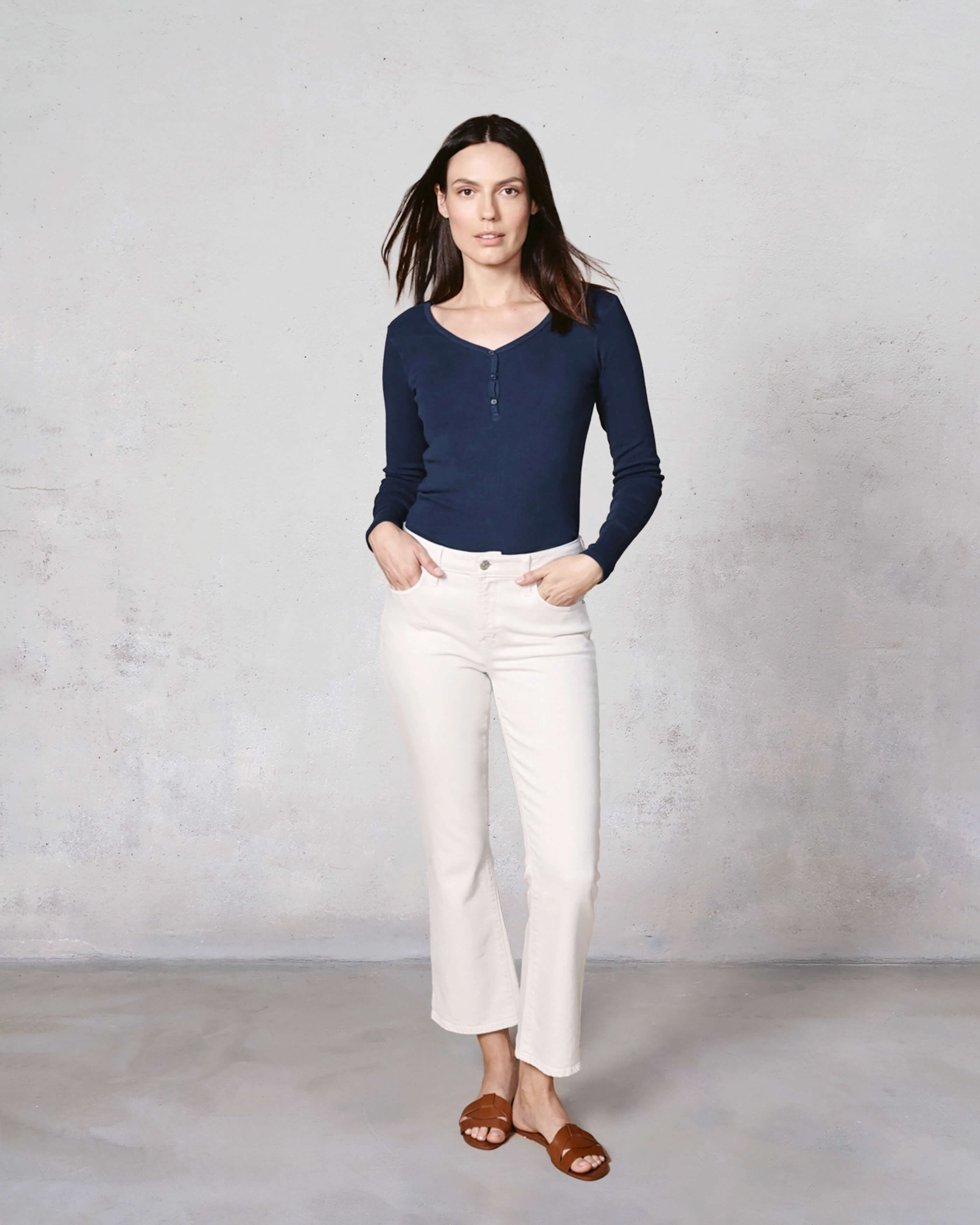 Discover our Vintage Navy Henley Long Sleeve Top, blending classic style with a modern fit for a flattering silhouette. Perfect for any casual occasion!