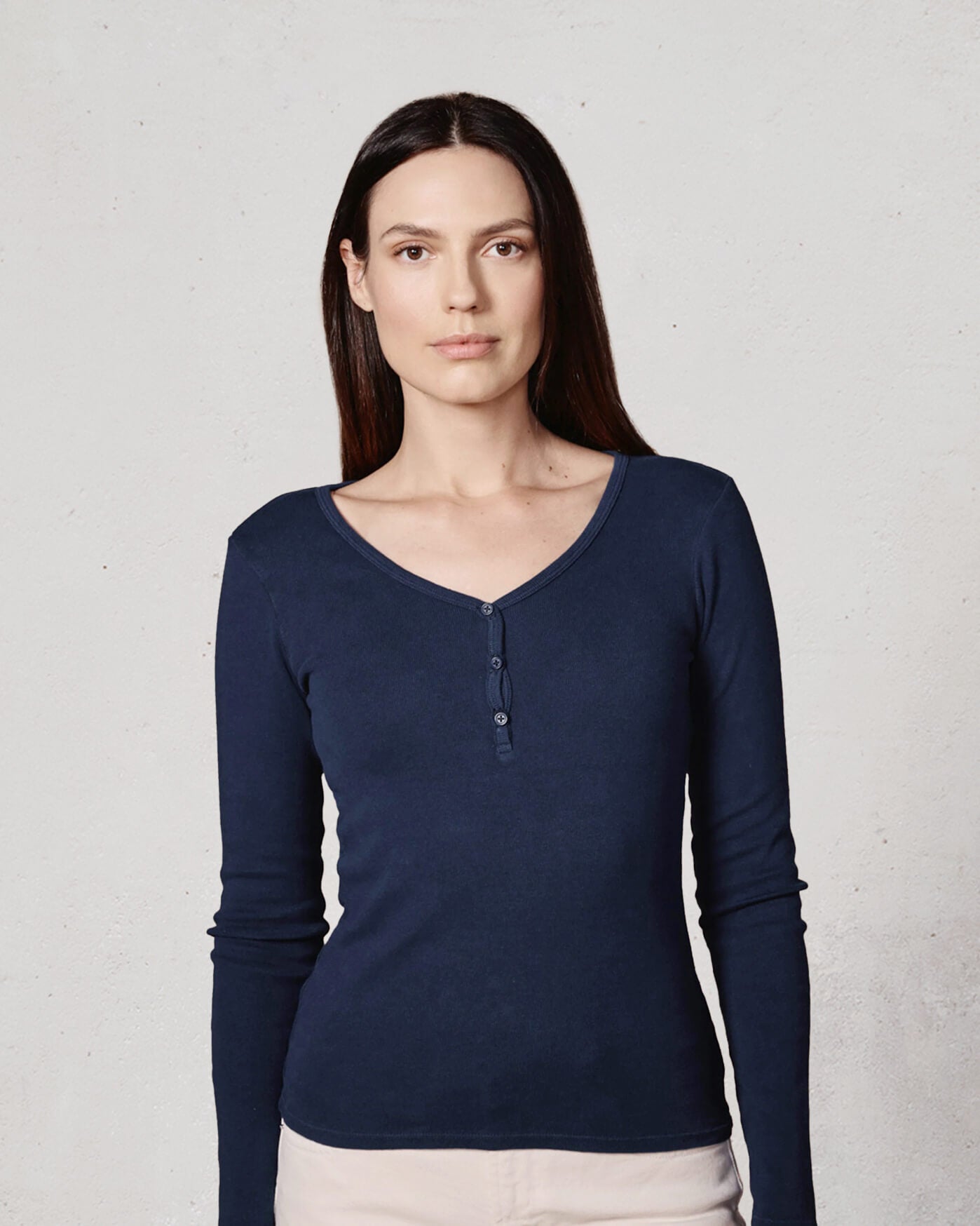 Discover our Vintage Navy Henley Long Sleeve Top, blending classic style with a modern fit for a flattering silhouette. Perfect for any casual occasion!