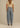 Discover the Kayla denim pant, a relaxed mini-barrel style inspired by 80s vintage. With a slightly tapered fit, it's the perfect blend of comfort and style.