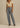 Discover the Kayla denim pant, a relaxed mini-barrel style inspired by 80s vintage. With a slightly tapered fit, it's the perfect blend of comfort and style.