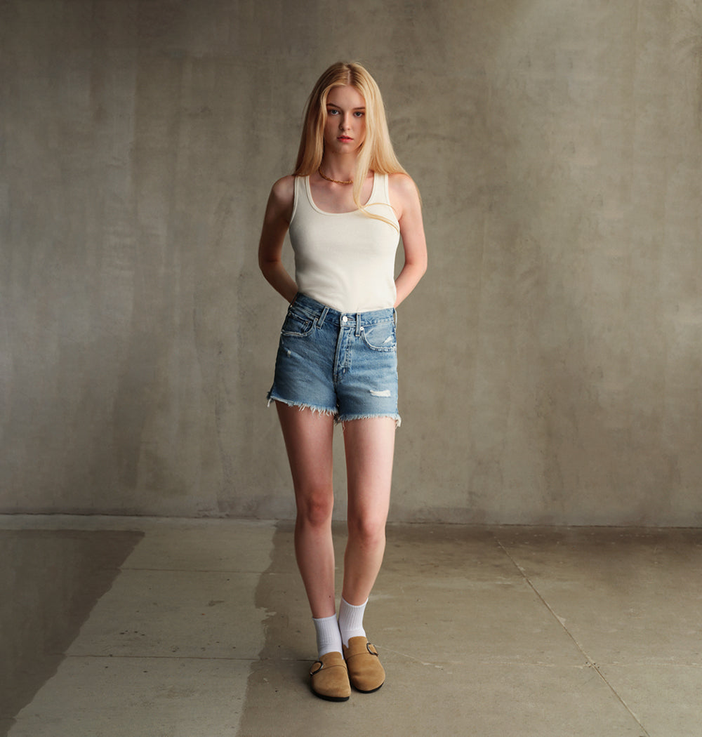 Discover the Edwin Cai Cut-off Short, a relaxed mid-rise design that combines vintage style with modern comfort, offering the perfect fit for effortless summer style.