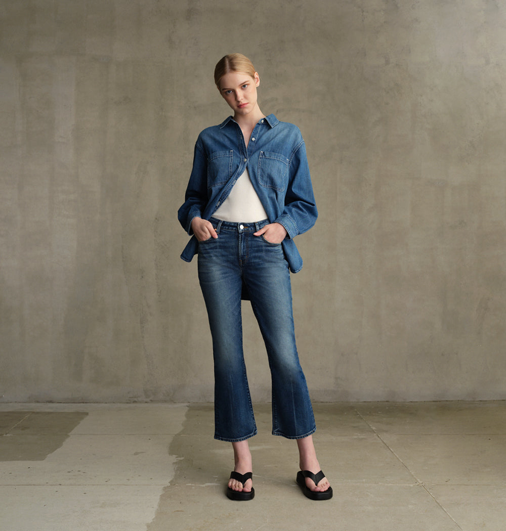Explore our Tempest Denim Shirt, made from lightweight, non-stretch denim with a straight fit, western detailing, and two front pockets.