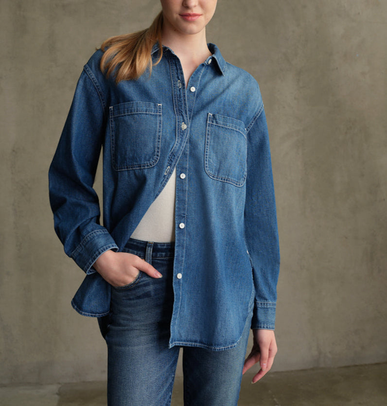 Explore our Tempest Denim Shirt, made from lightweight, non-stretch denim with a straight fit, western detailing, and two front pockets.