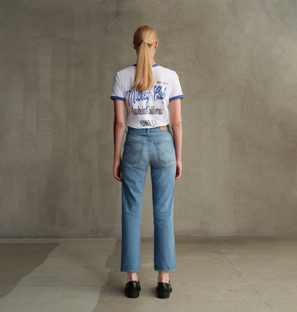 With its perfectly cut straight leg and vintage light wash, this jean is a timeless staple with a distinctly contemporary edge. High-rise and clean-lined.