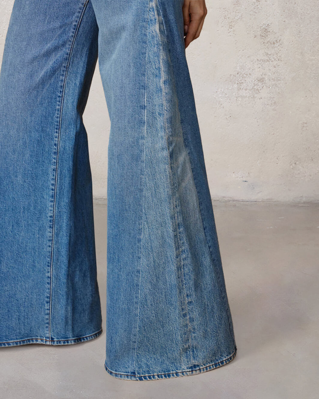 Discover the Marli Wide Leg in Fowler, a stylish high-rise denim pant that flatters your waist and hips with a relaxed fit. Perfect for any occasion!