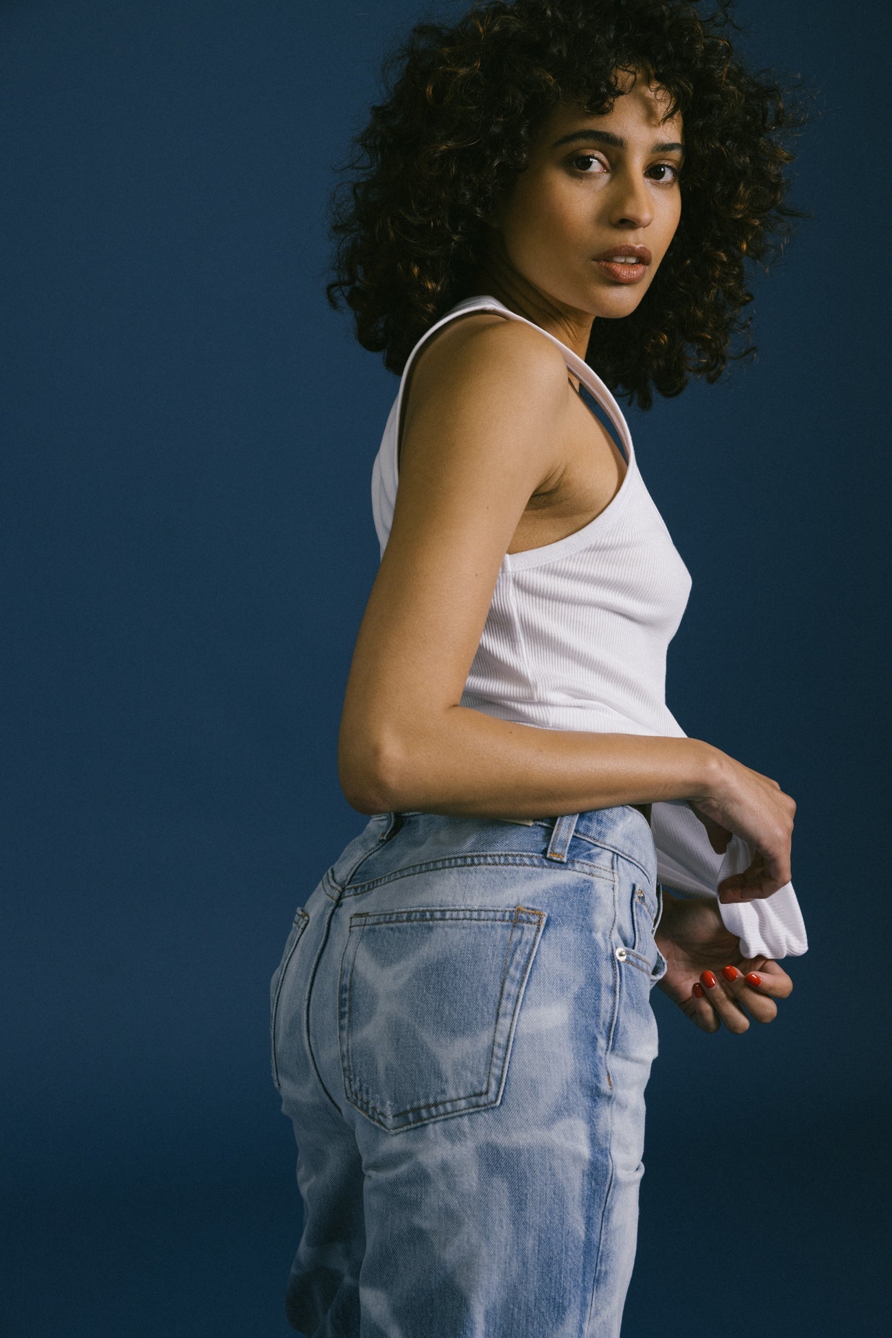Elevate your style with the Marli Wide Leg in Pool Laser. This high-rise, wide-leg design flatters your waist and hips, perfect for making a bold statement.